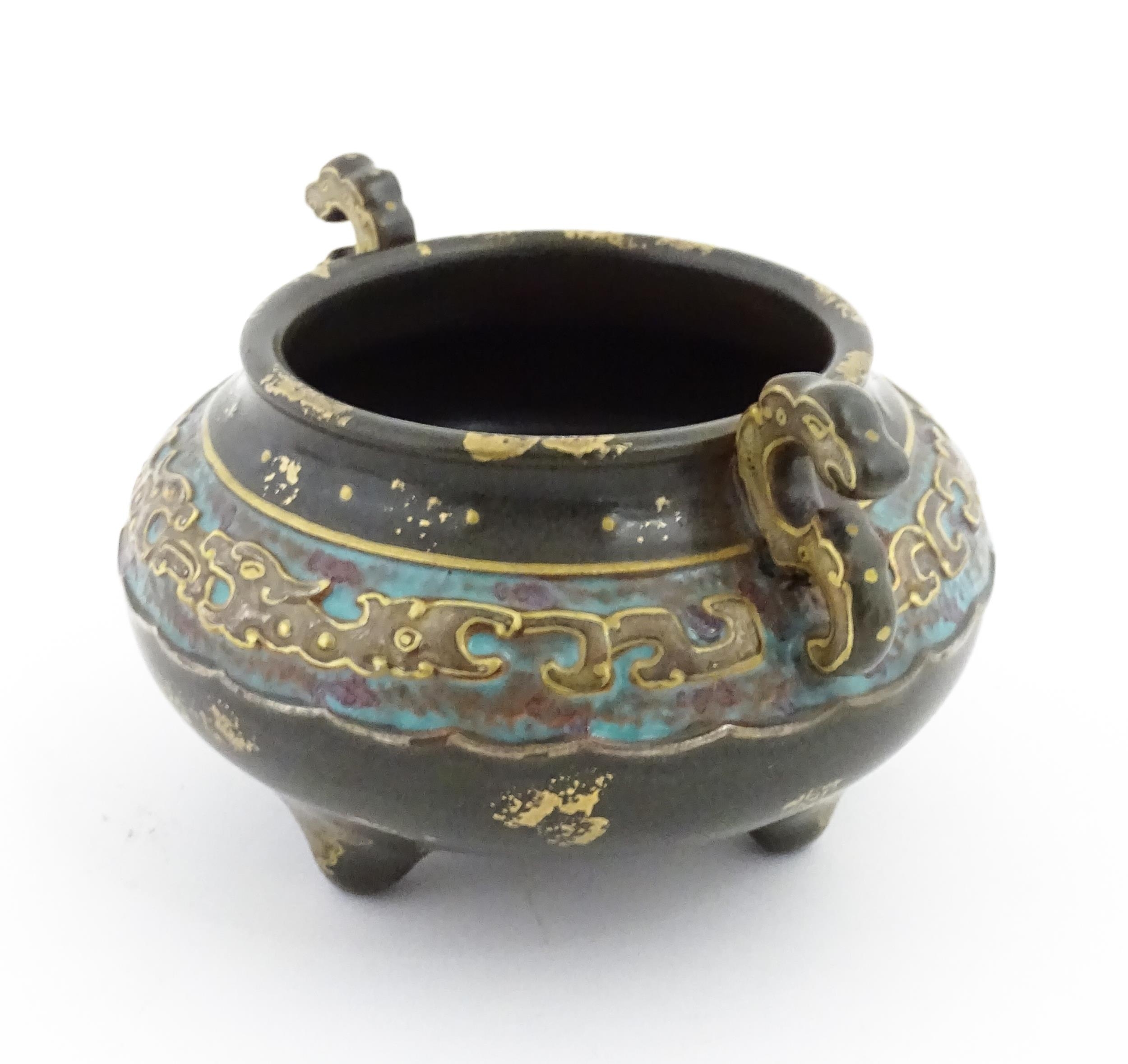 A small Chinese censer with twin handles with banded decoration in relief depicting stylised dragons - Image 3 of 8