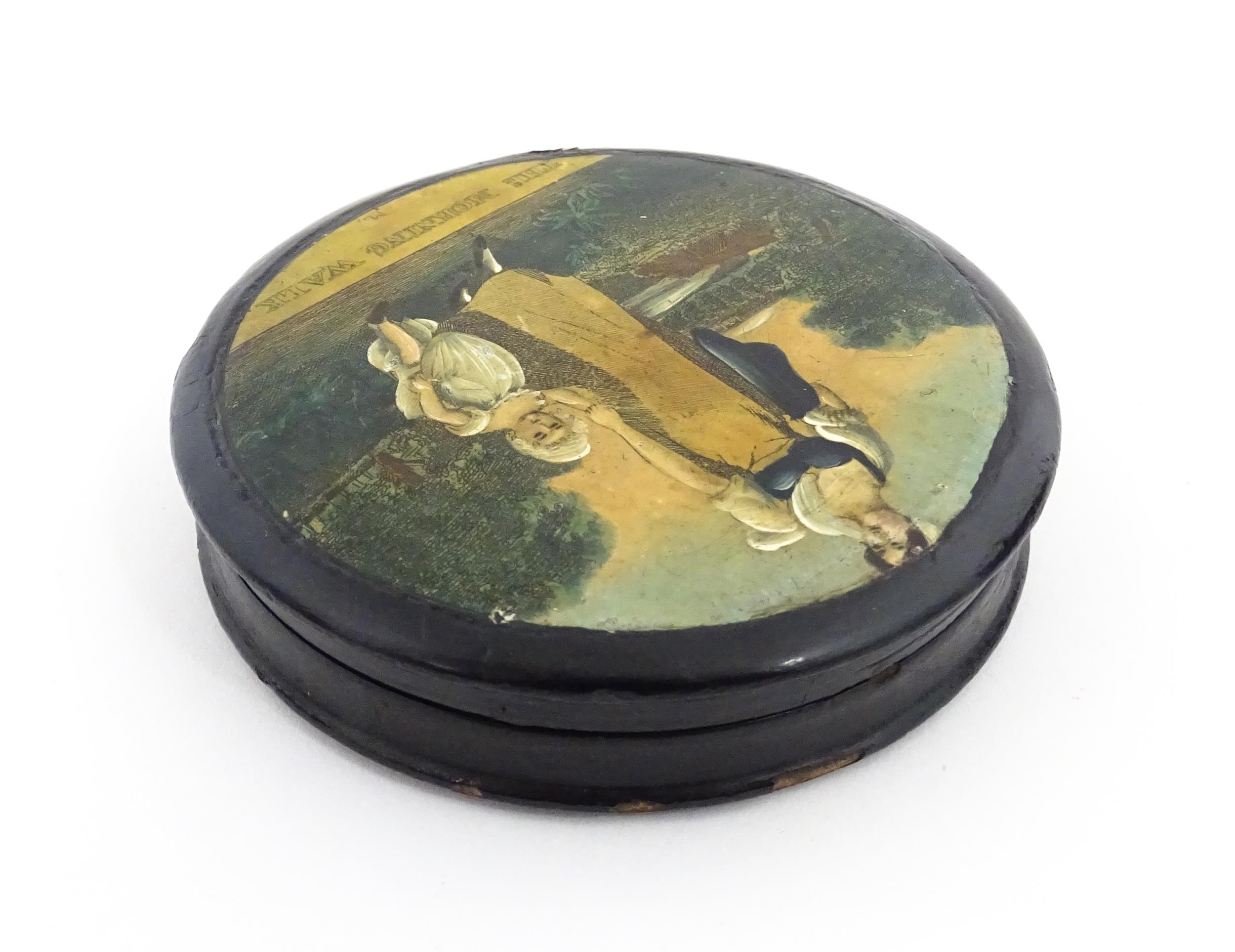 A 19thC papier mache lacquered snuff box of circular form, the lid with applied engraving titled The - Image 5 of 10