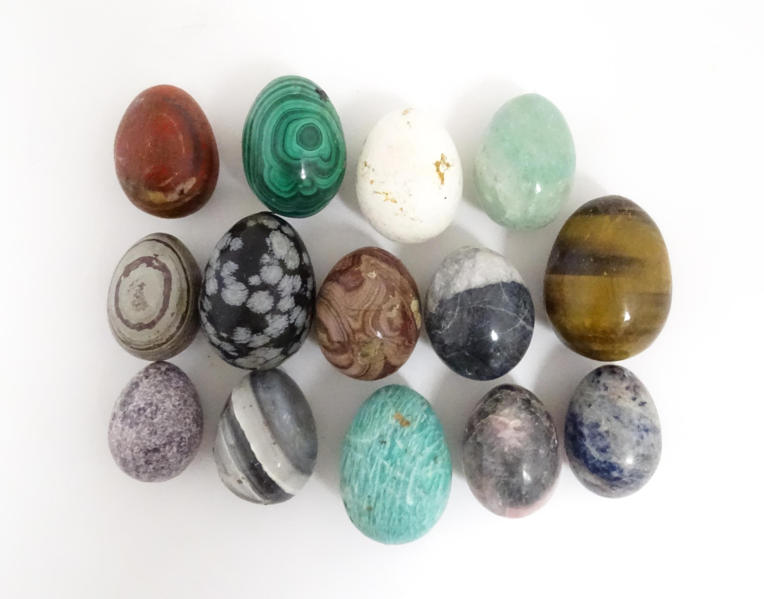 Natural History / Geology Interest: A quantity of assorted polished hardstone eggs to include