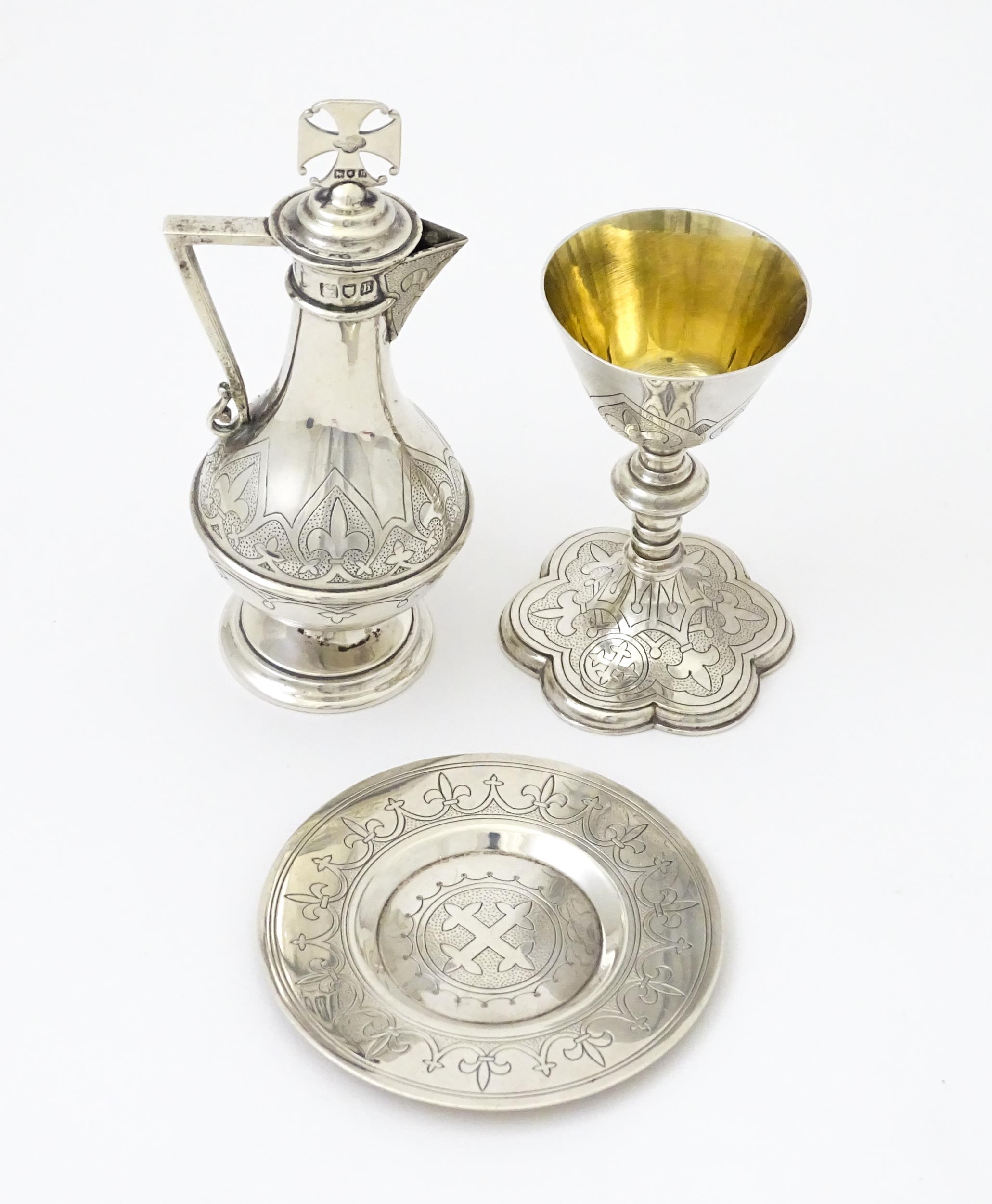 Ecclesiastical silver: A silver three piece travelling communion set comprising chalice, paten &