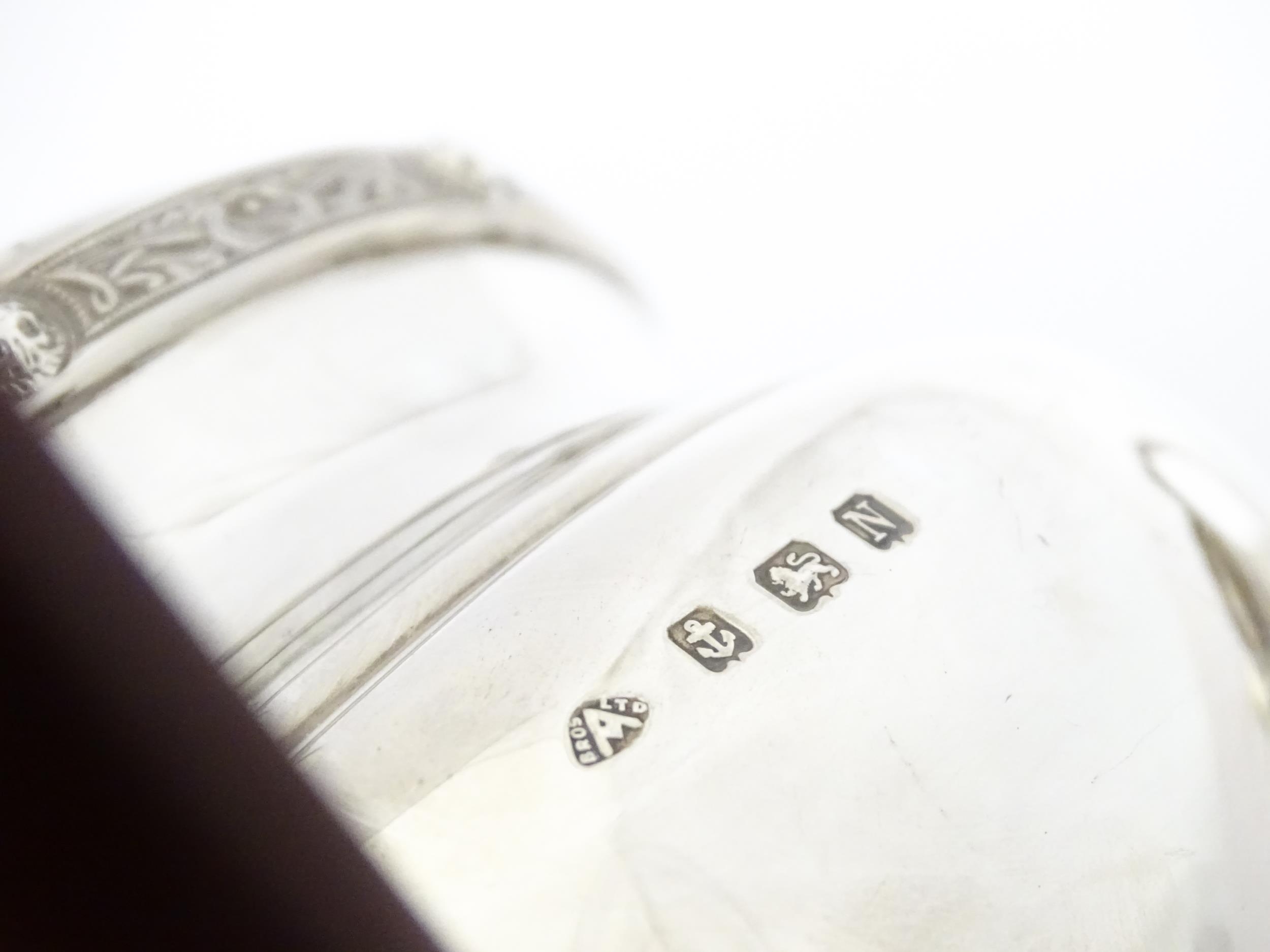 A three piece silver tea set comprising teapot, hot water pot and cream jug, with Celtic style - Image 7 of 20