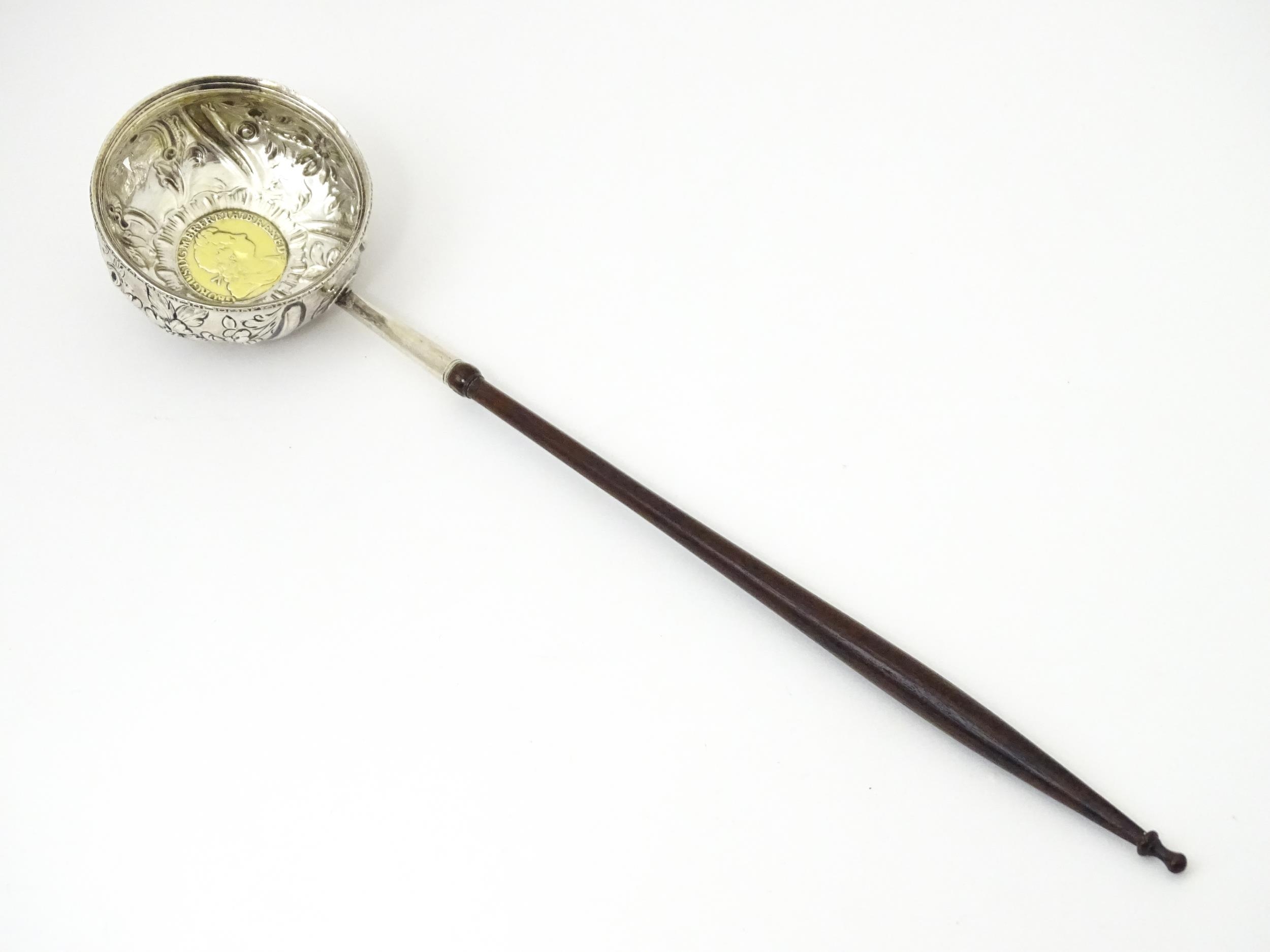 A white metal punch ladle with coin style detail to bowl. Approx 11" long overall Please Note - we - Image 3 of 6