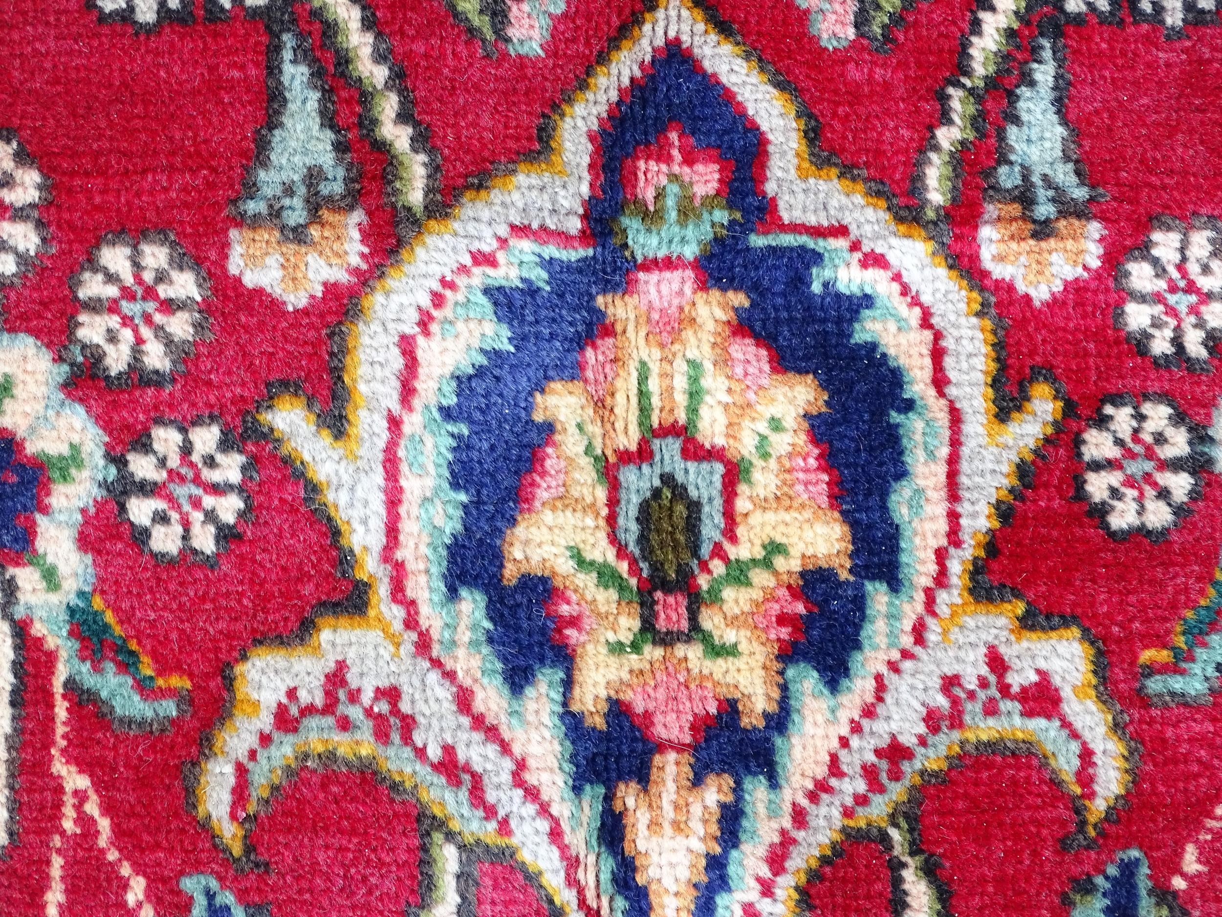 Carpet / Rug: A North West Persian Tabriz carpet the red ground with central cream and blue - Image 10 of 11