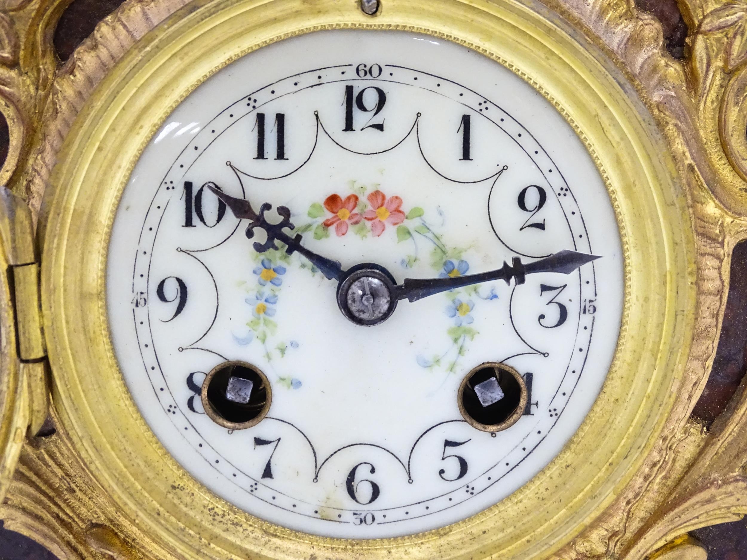 A French 8-day mantel clock striking on a bell, the rouge marble base housing a movement by A. D. - Image 8 of 16