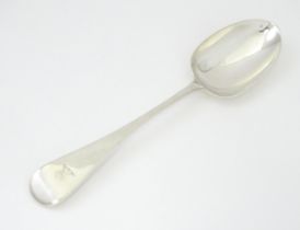 A Victorian silver table spoon hallmarked London 1857 maker John Samuel Hunt. With military broad