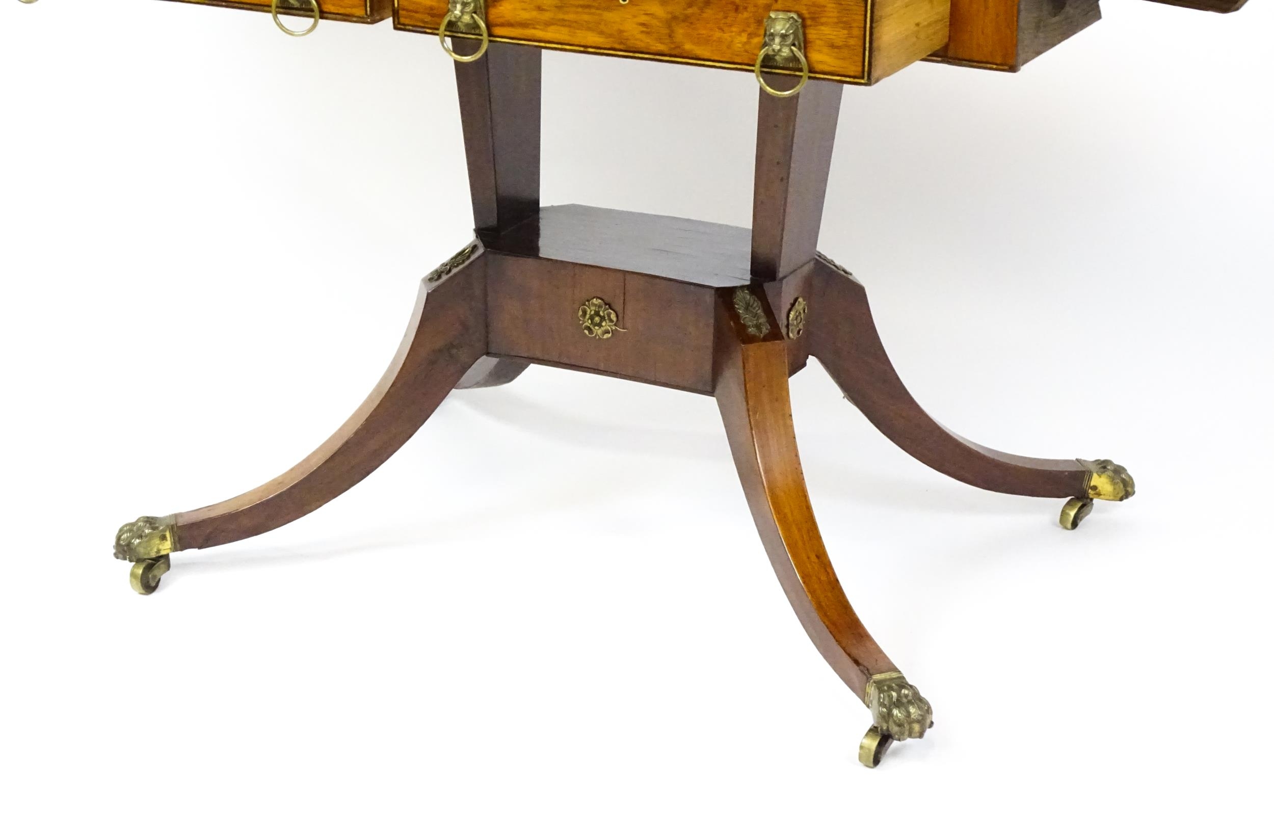 A 19thC and later sofa table with drop flaps to either side, two small frieze drawers opposing two - Image 8 of 10