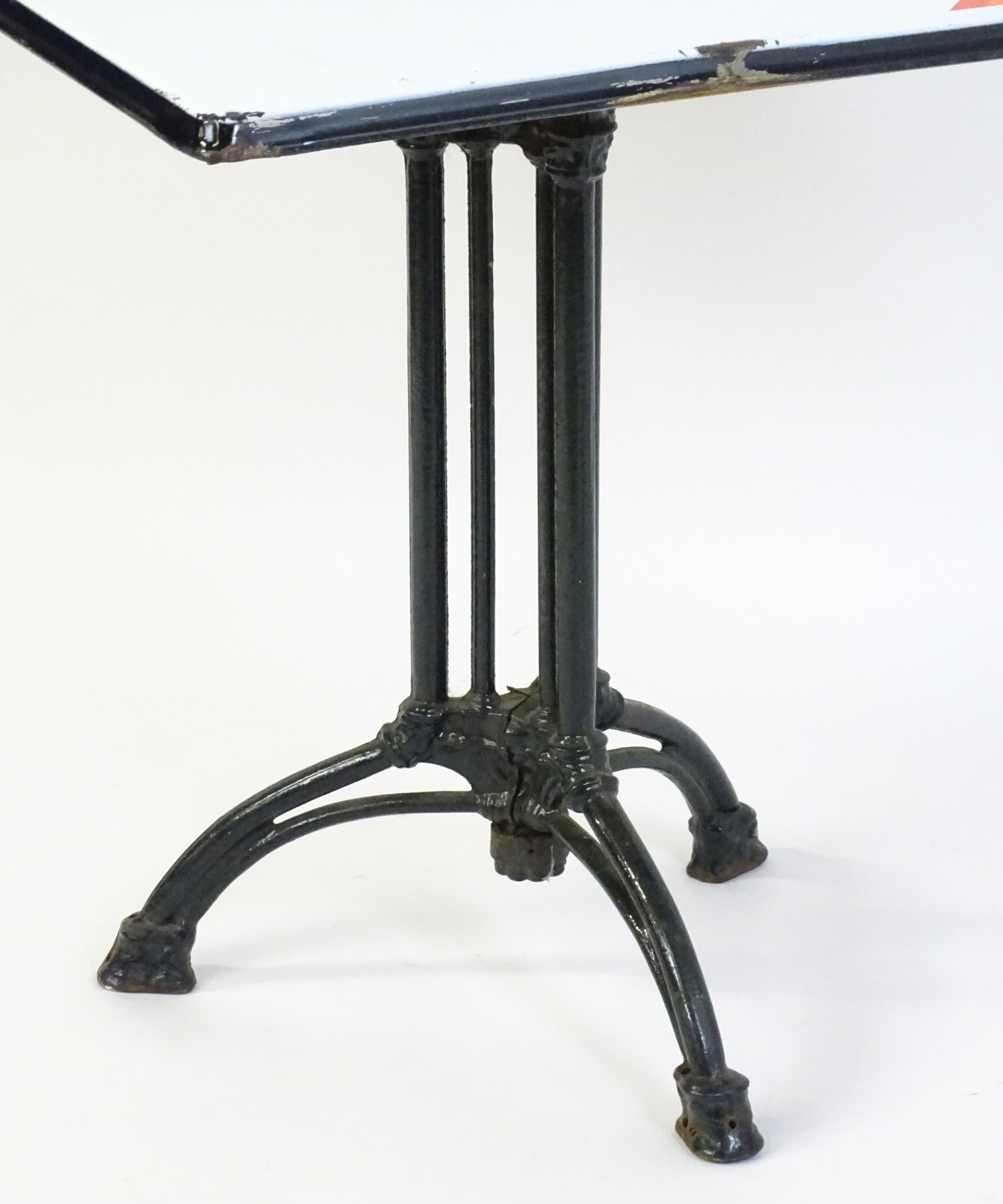 An early 20thC cast iron based pub / cafe / bistro table, with squared advertising top marked - Image 3 of 12
