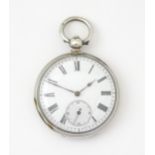 A silver cased pocket watch with white enamel dial, Roman numerals and subsidiary seconds dial.