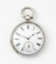 A silver cased pocket watch with white enamel dial, Roman numerals and subsidiary seconds dial.