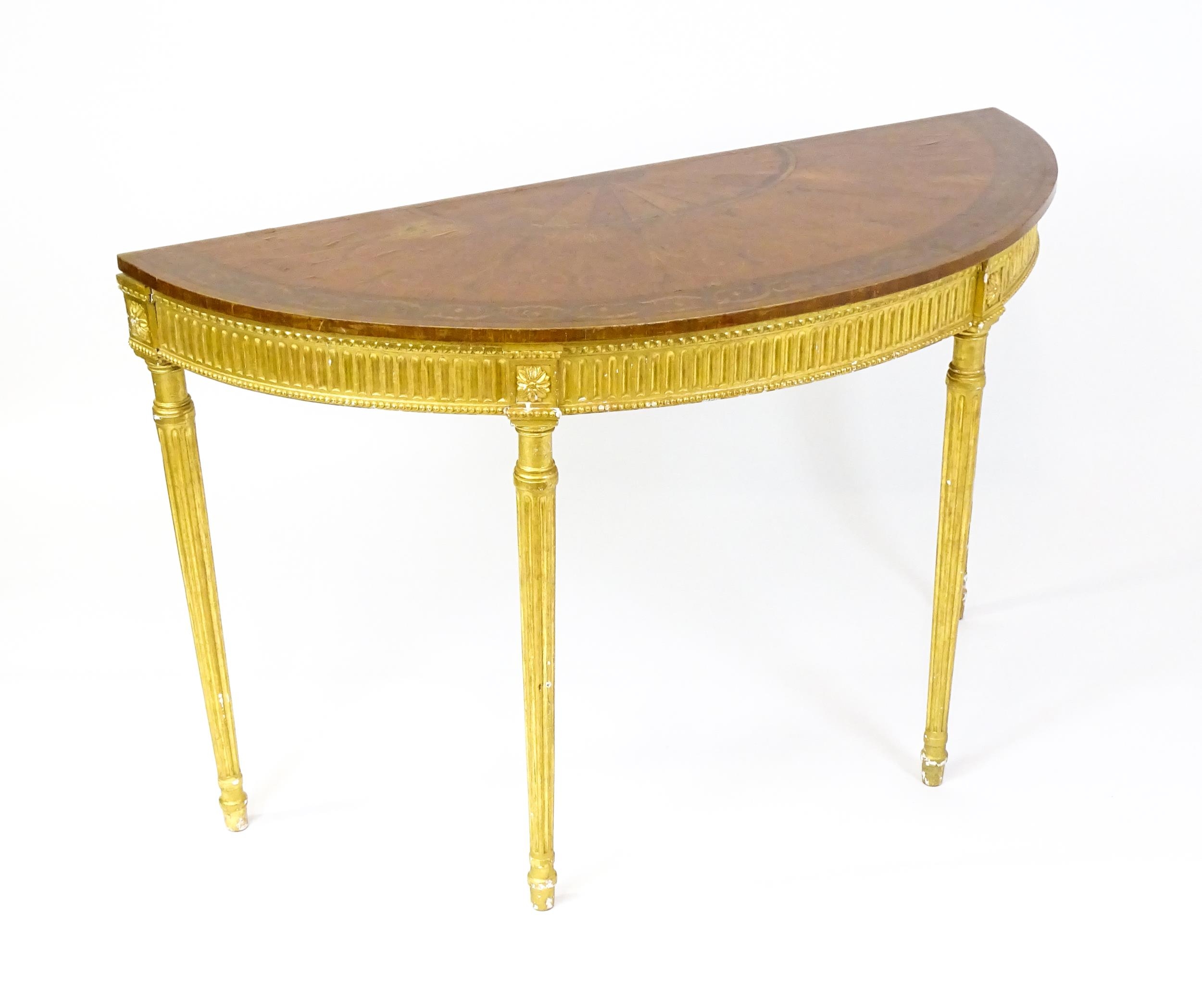 A demi lune console table with a marquetry inlaid top above a fluted frieze and moulded floral - Image 10 of 11