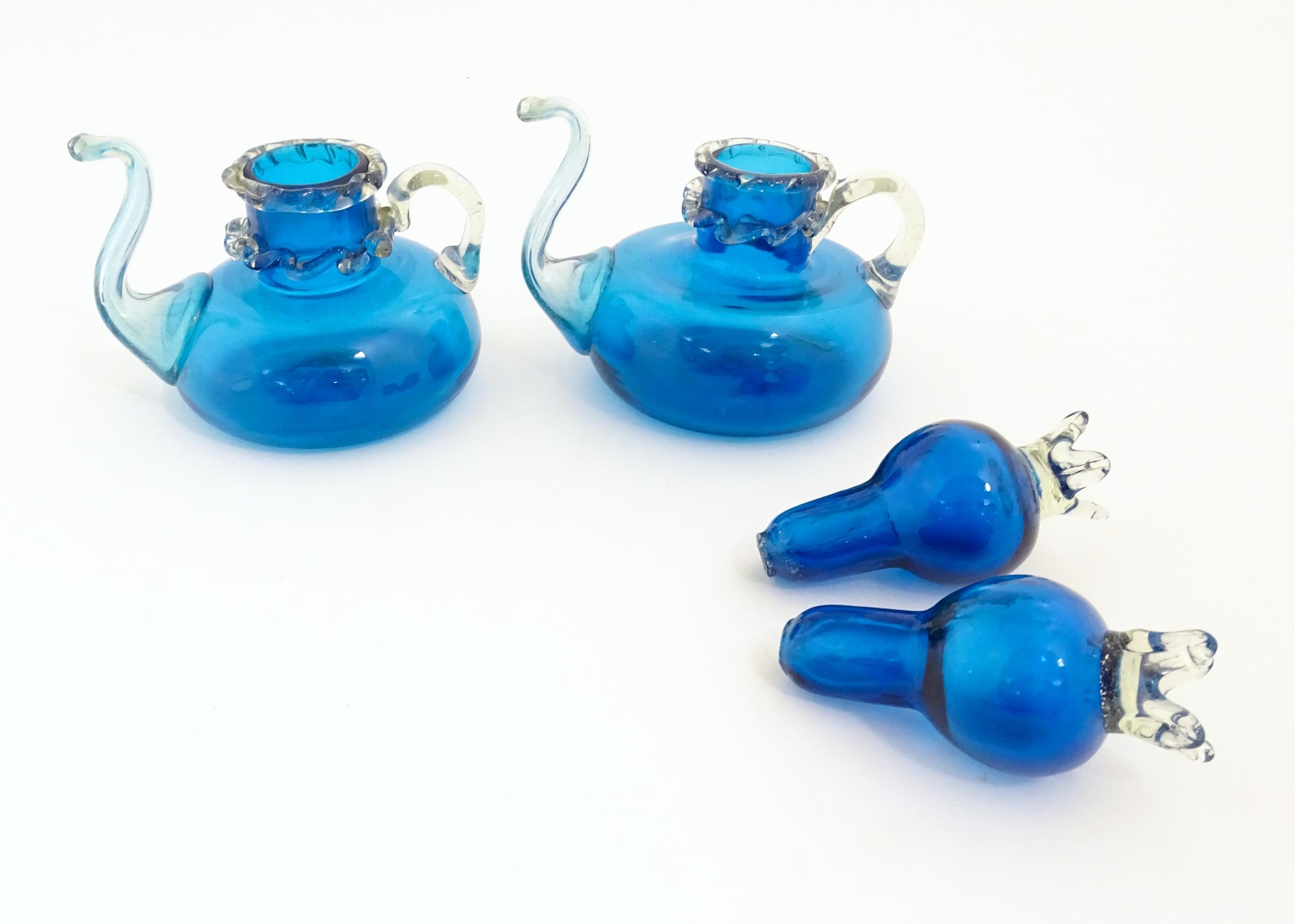An unusual pair of turquoise glass oil / vinegar bottles of teapot form, the lids surmounted by - Image 3 of 11