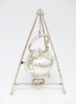 An Elkington plate silver plated spirit kettle and stand formed as a hanging gypsy kettle. Approx.