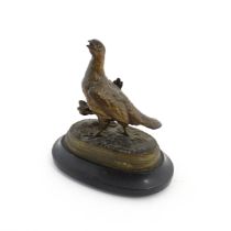 A 20thC cast bronze sculpture modelled as a partridge / bird after Jules Moigniez. Cast signature to