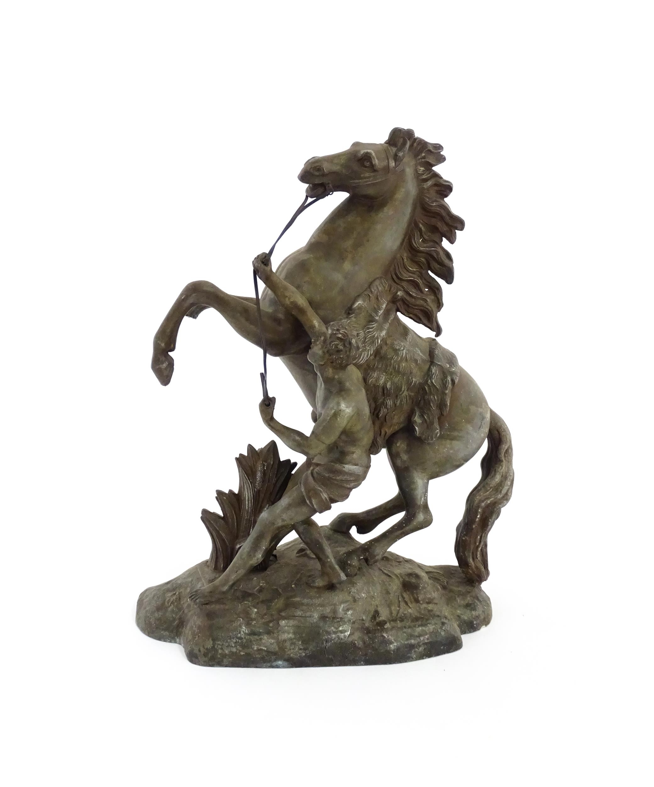 A 20thC cast Marly Horse modelled as a rearing horse with male attendant, after Guillaume Coustou I. - Image 5 of 8