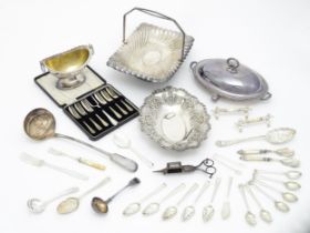 A quantity of assorted silver plated wares to include cake baskets, entree dishes, cake forks, berry
