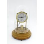 An American electric mantel clock by Barr , the dial with subsidiary seconds dial and signed Barr,