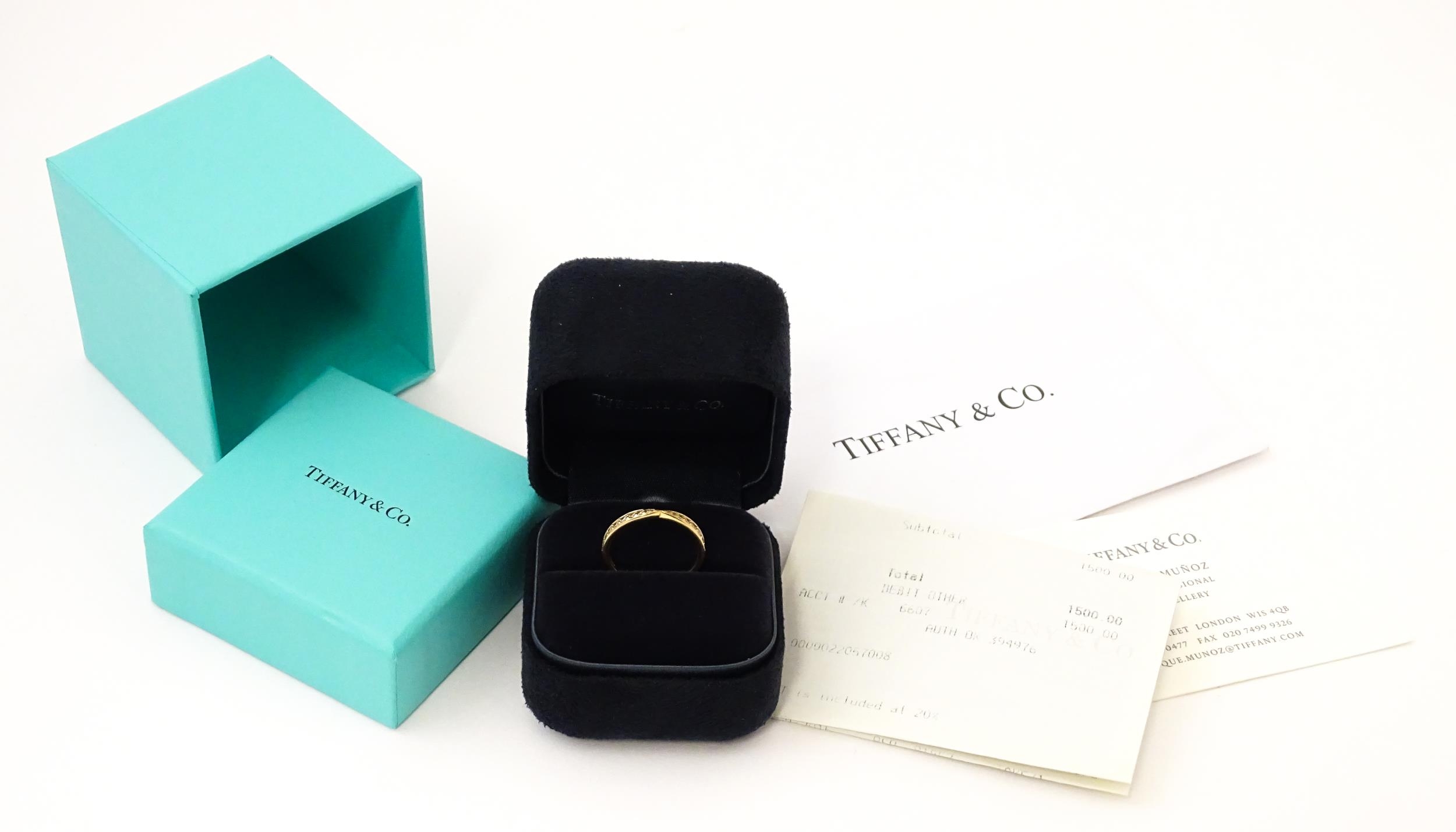An 18ct gold Tiffany ring set with diamonds. Ring size approx M Please Note - we do not make - Image 2 of 8