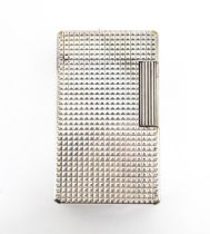 A 20thC silver plate lighter, marked S.T. Dupont. With a fitted leather case. Approx. 2 1/4" high