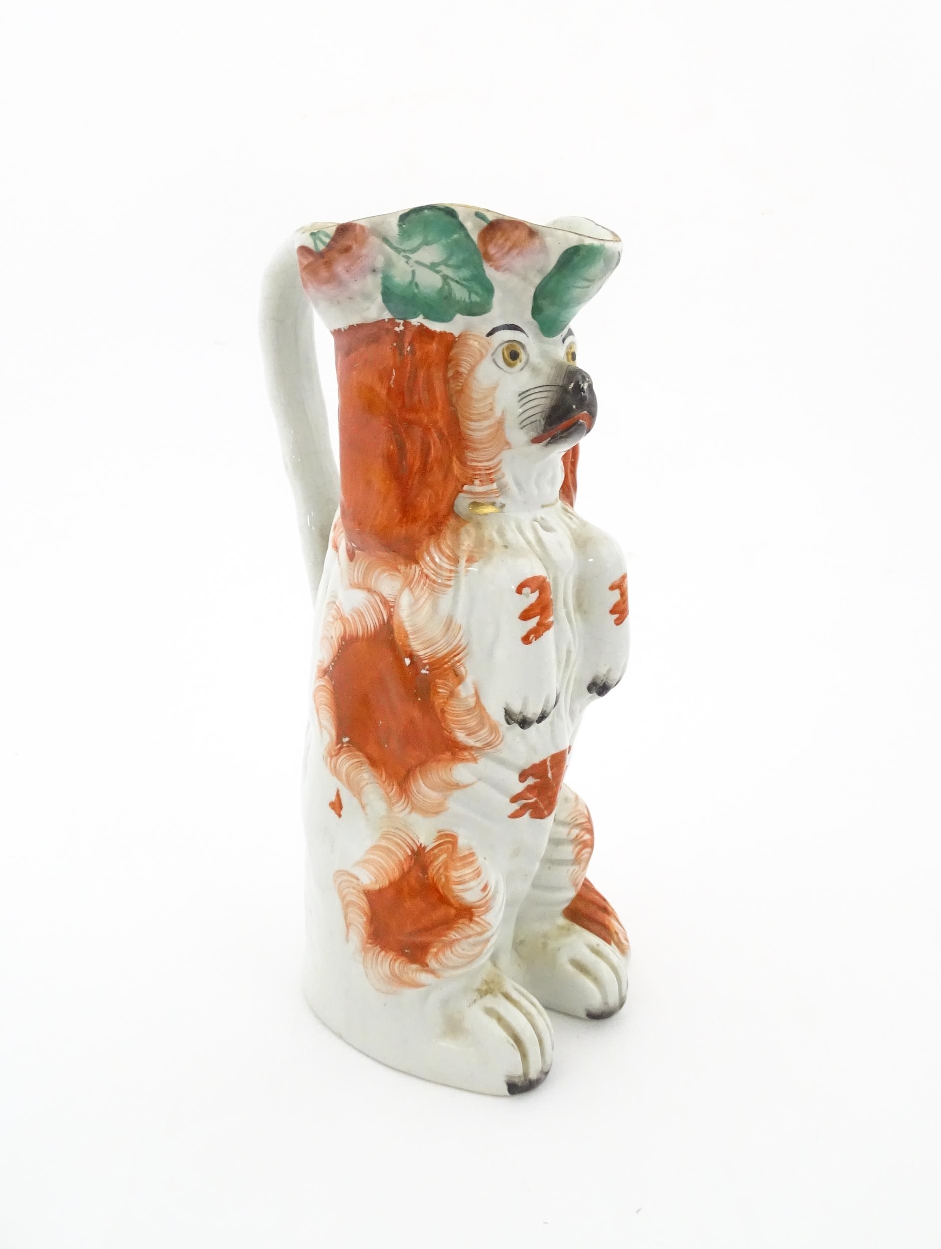 A Victorian Staffordshire jug modelled as a dog wearing a hat with fruiting vine decoration. Approx. - Image 7 of 10