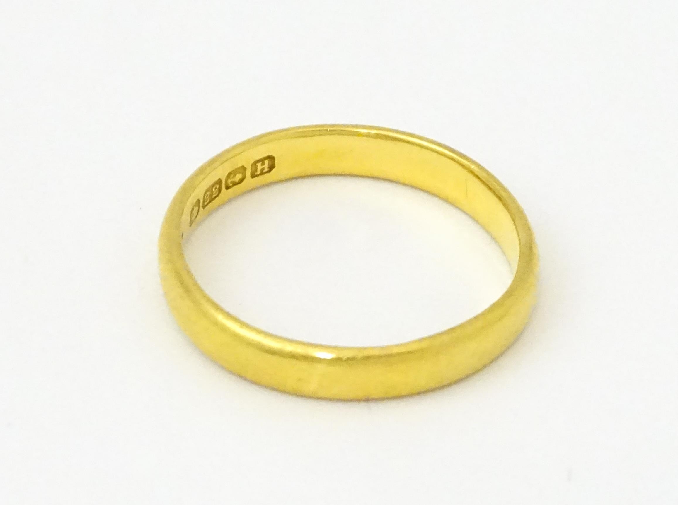 A 22ct gold ring / wedding band. Ring size approx. L 1/2 Please Note - we do not make reference to - Image 5 of 6