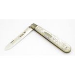 A Victorian silver folding fruit knife with mother of pearl handle, hallmarked Sheffield 1899, maker