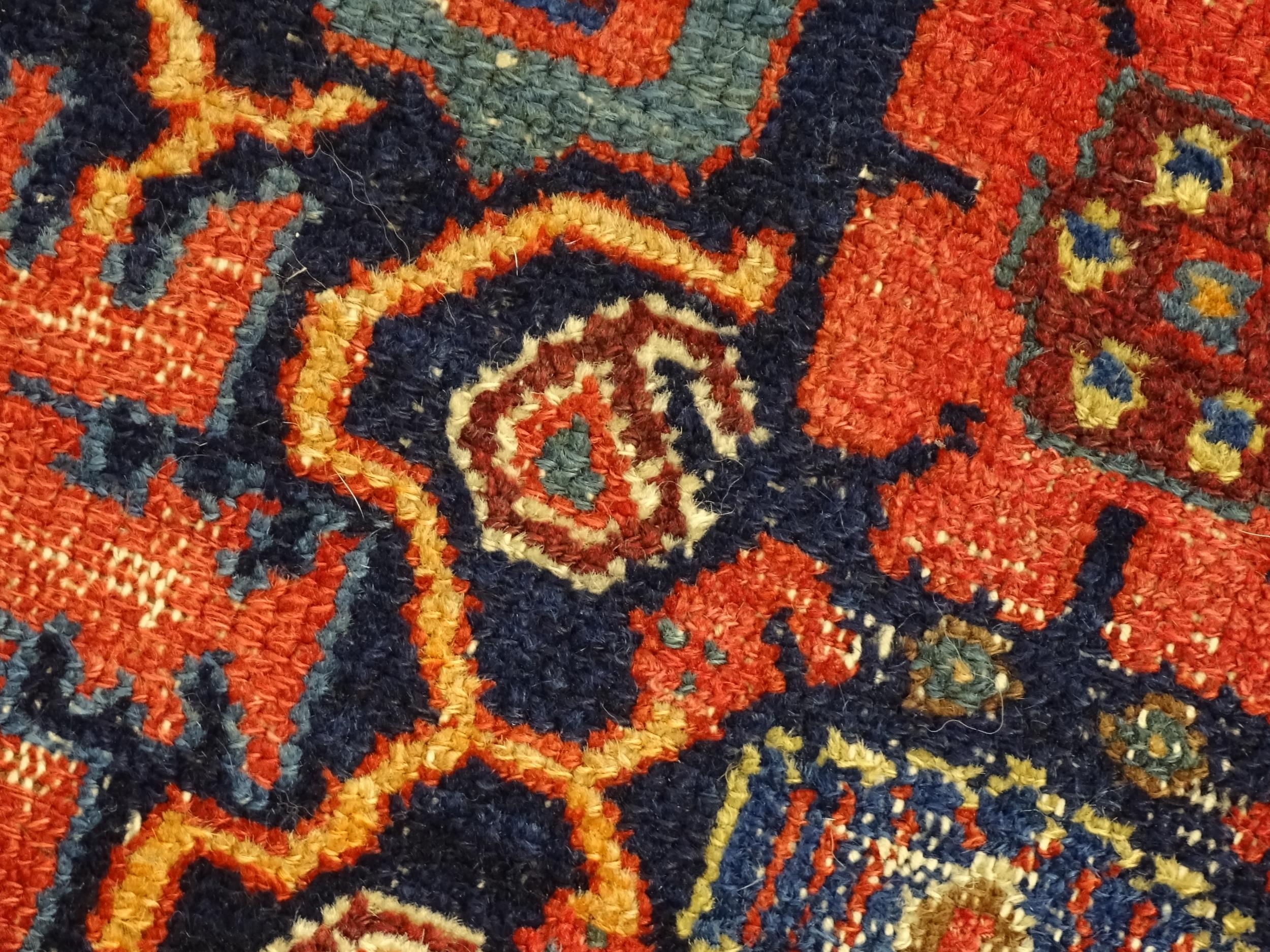 Carpet / Rug: A blue ground rug decorated with repeating geometric motifs of stylised floral and - Image 8 of 8