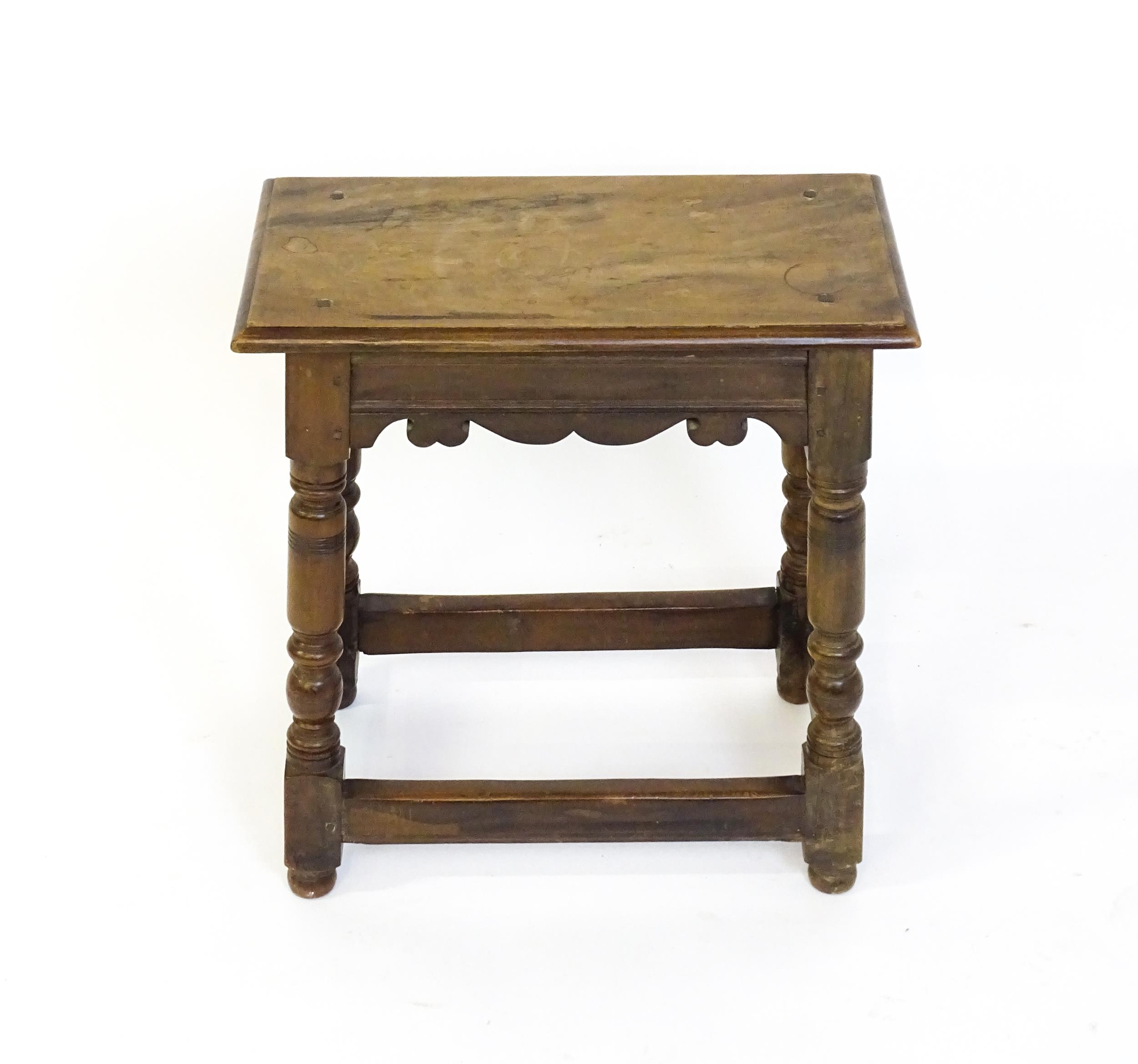 A 19thC walnut join stool of peg jointed construction, with a rectangular top above a moulded - Image 4 of 6