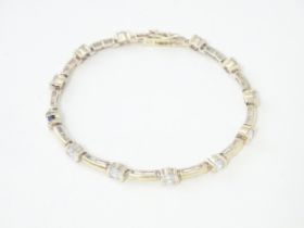 A .925 Silver bracelet set with cubic zirconia. Approx 7 1/2" long Please Note - we do not make