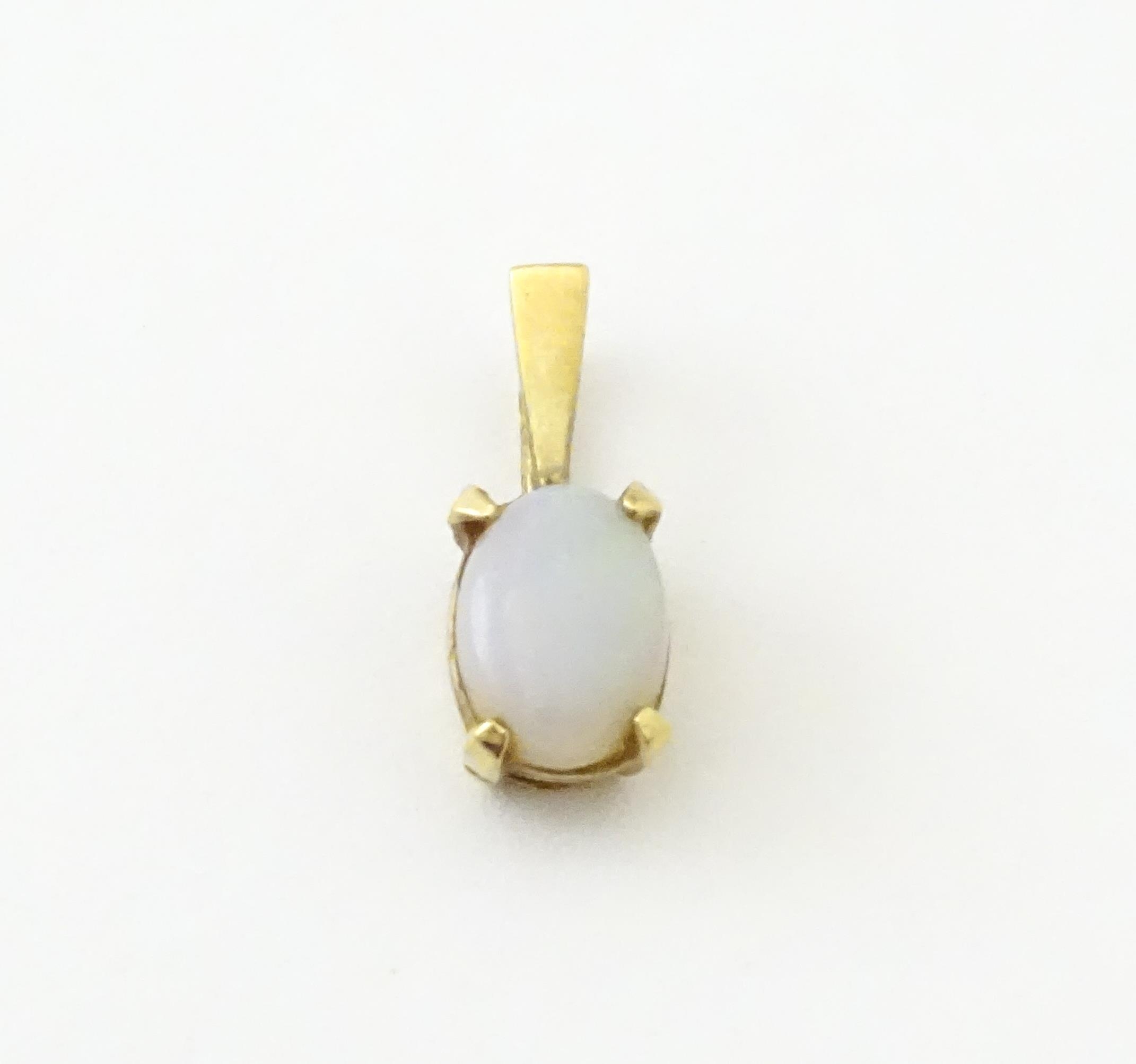 A 9ct gold pendant set with opal together with a pendant set with tigers eye cabochon. Approx 1 1/2" - Image 5 of 9