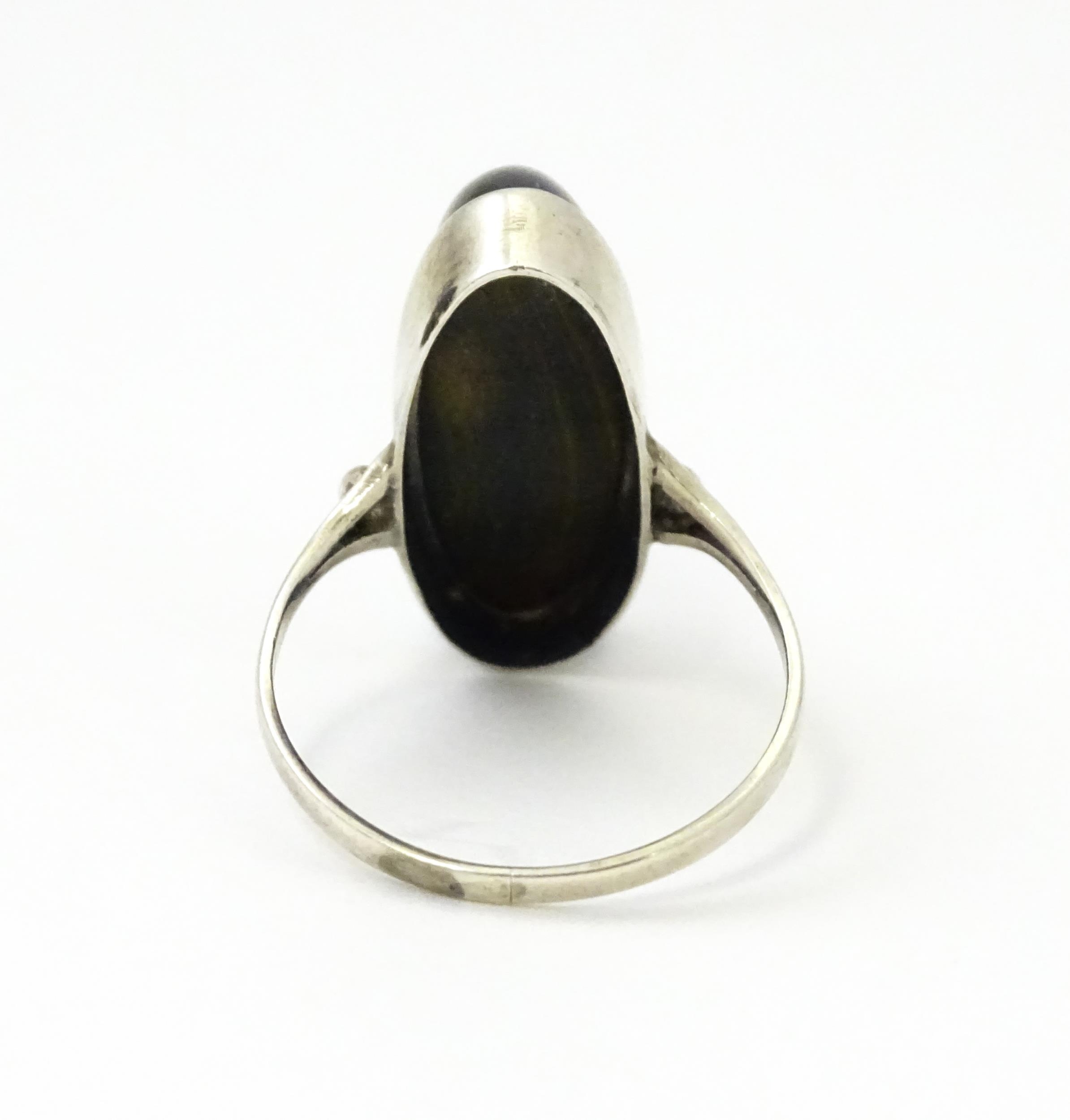 A silver ring set with cabochon. Ring size approx. S Please Note - we do not make reference to the - Image 6 of 8