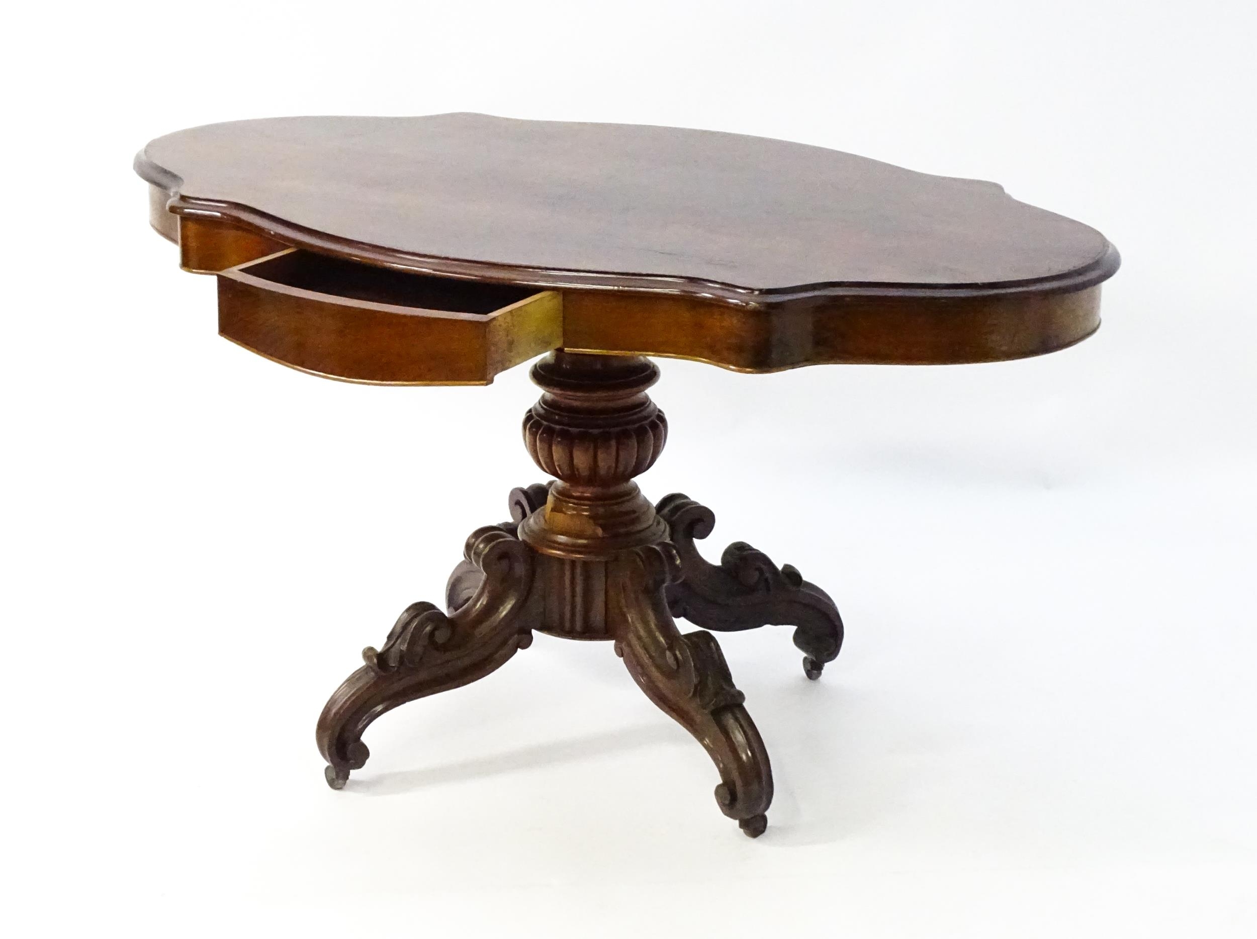 A 19thC mahogany centre table with a moulded top having two frieze drawers, the pedestal having - Image 6 of 9