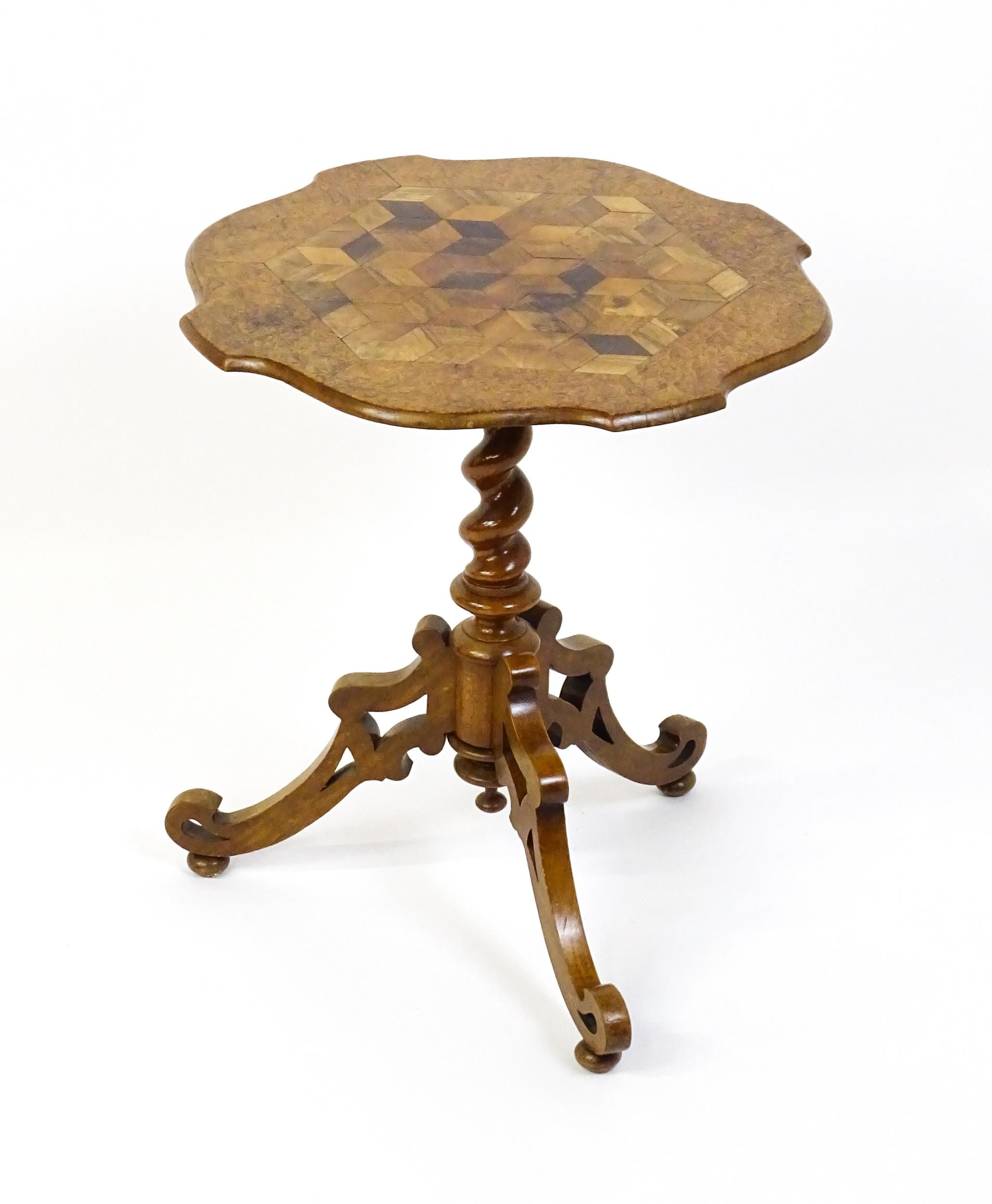 A 19thC tripod table with a burr amboyna veneered top surrounding a central parquetry style sample - Image 2 of 10