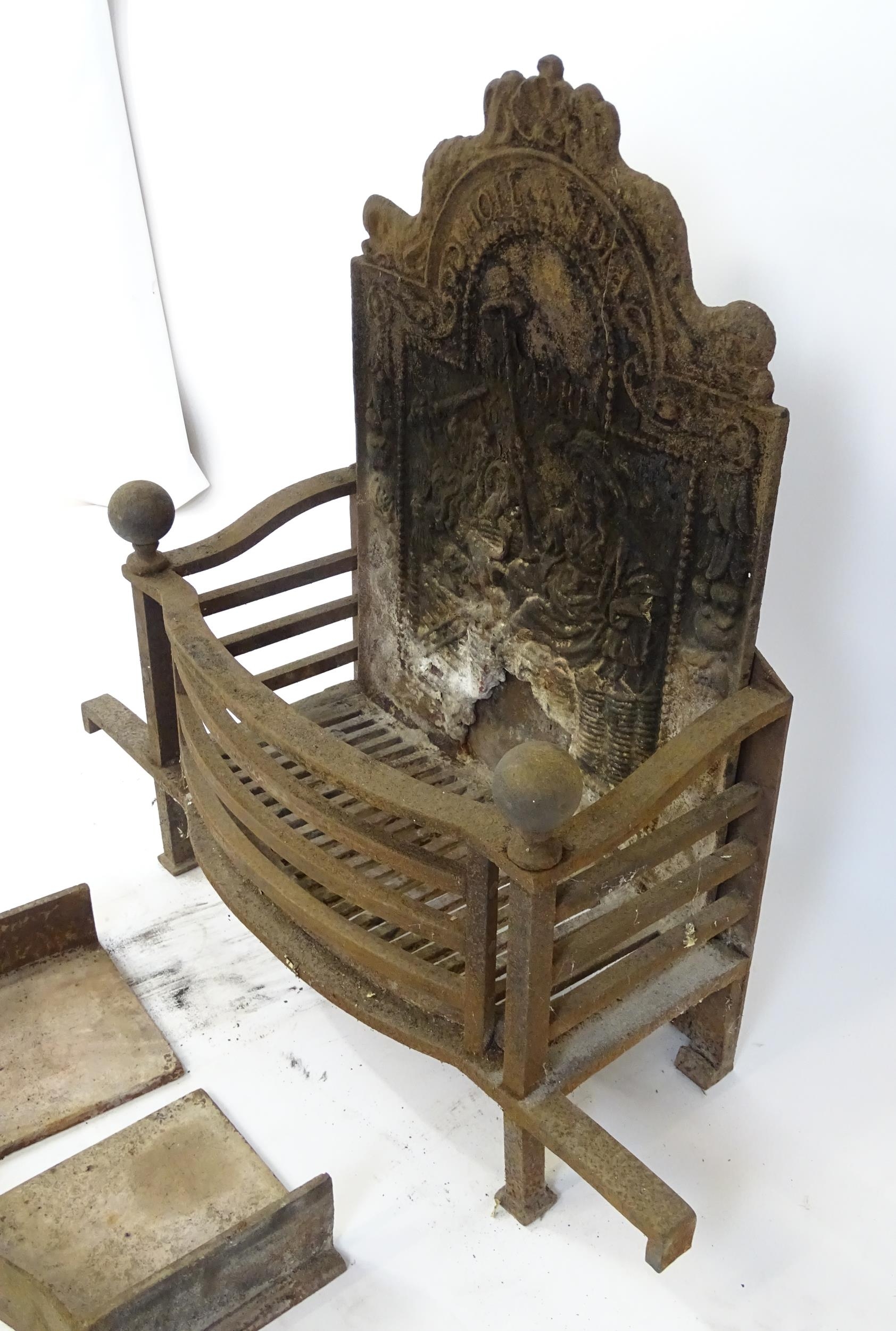 A large cast iron fire basket, the back decorated with figure and lion, marked 'Hollandia Pro - Image 17 of 18