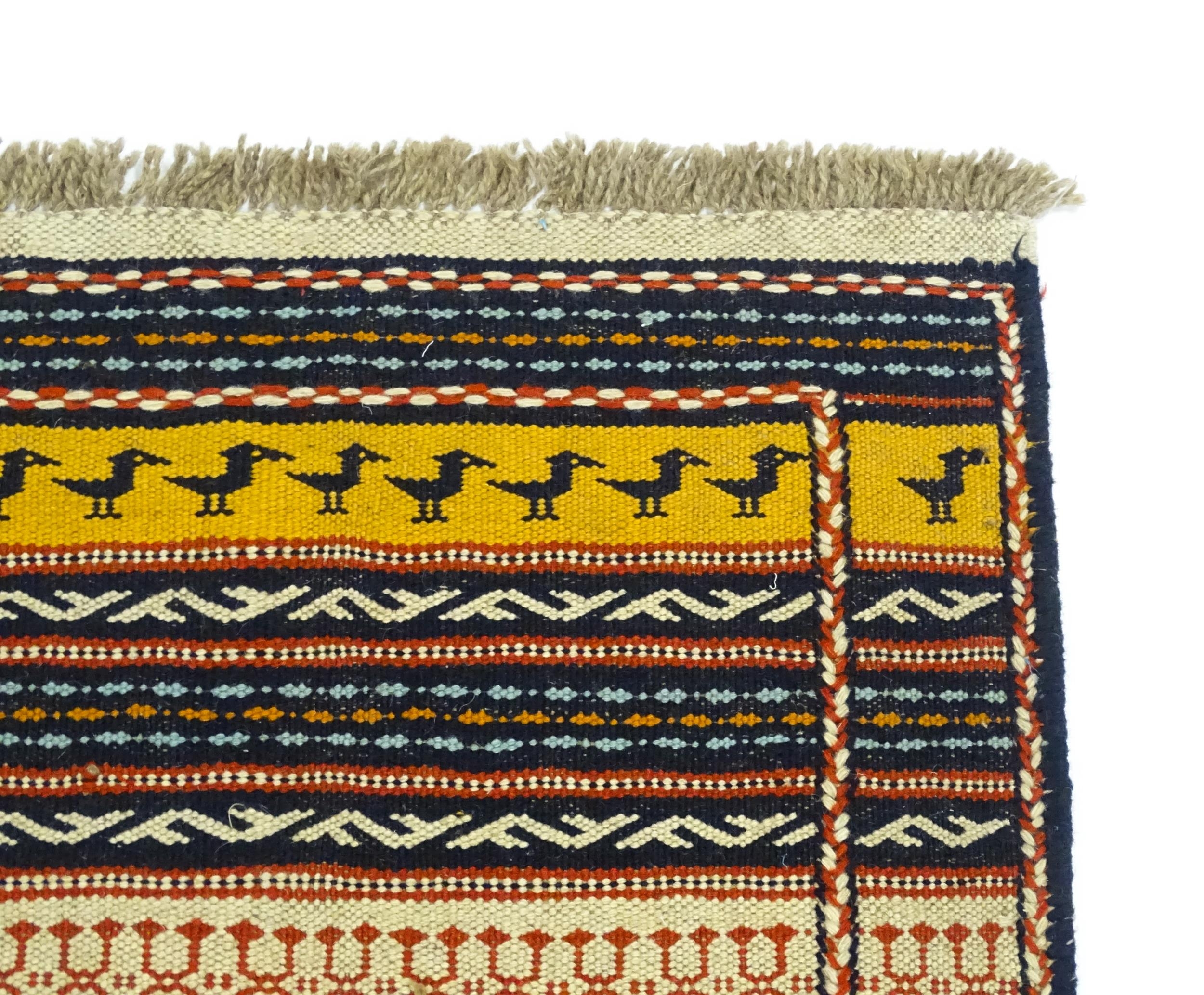 Carpet / Rug : A North East Persian Sumak kilim rug with banded geometric detail and repeating - Image 10 of 11