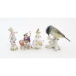 Four assorted items to include a Karl Ens model of a bird, a Continental vase and cover with hand