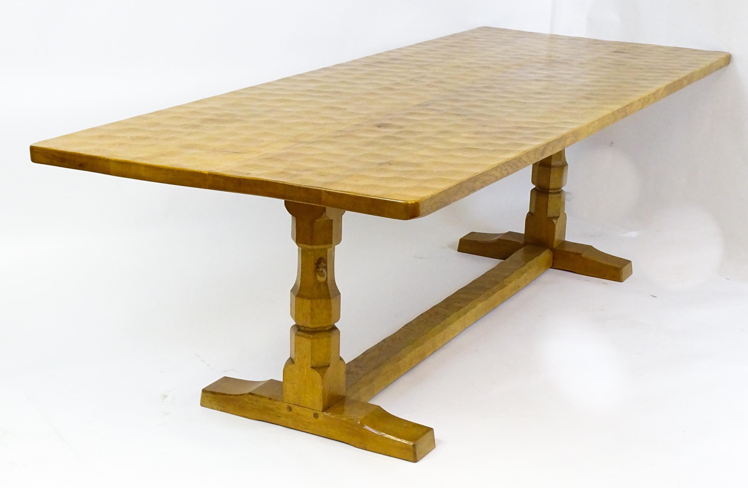 A mid 20thC Robert 'Mouseman' Thompson dining table. The 8ft long oak table top with an adzed finish - Image 8 of 22