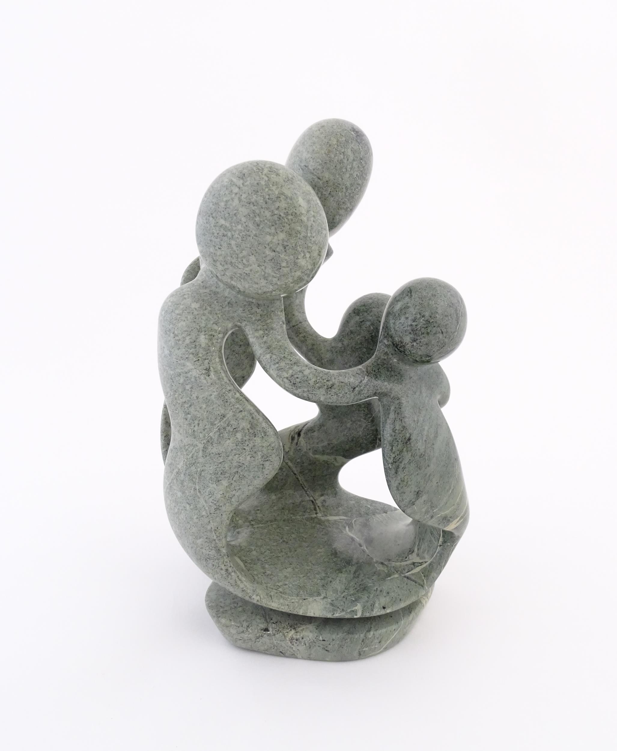 An African carved soapstone sculpture Family of Four, depicting four stylised figures, by Agrippa - Image 5 of 9