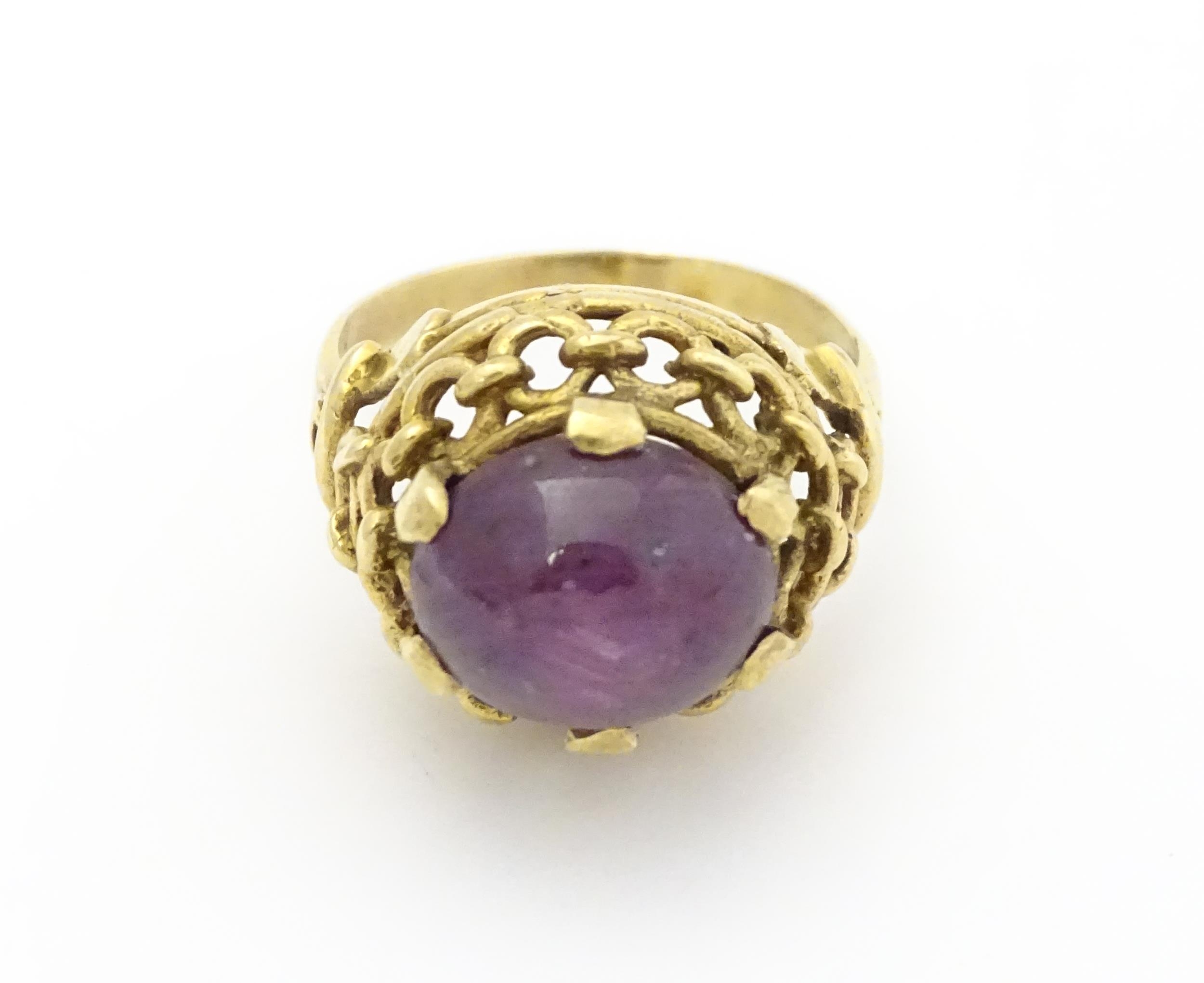 A 9ct gold ring set with ruby cabochon. Ring size approx. O Please Note - we do not make reference - Image 3 of 9