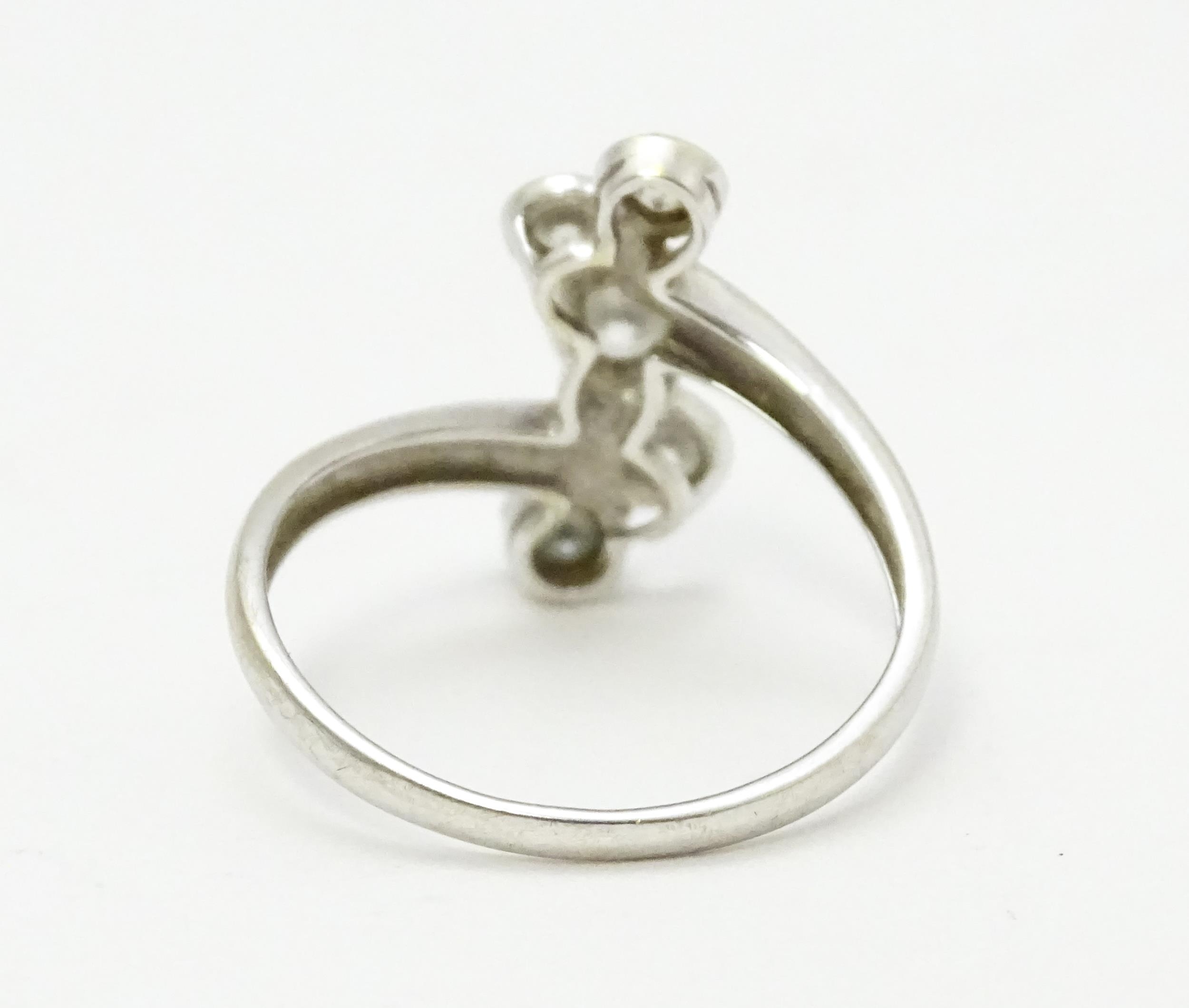 A 14ct white gold ring set with five white stones. Ring size approx. U Please Note - we do not - Image 6 of 8