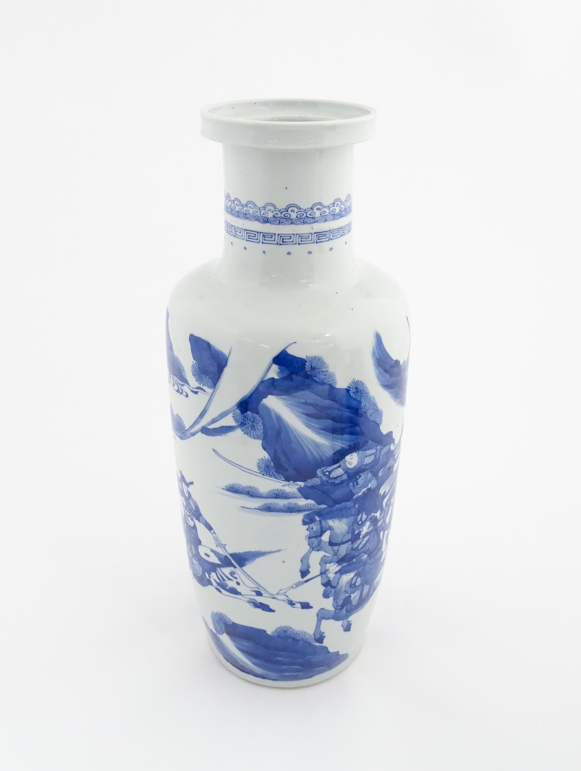 A Chinese blue and white vase decorated with warriors and horses in a landscape. Character marks - Image 4 of 9