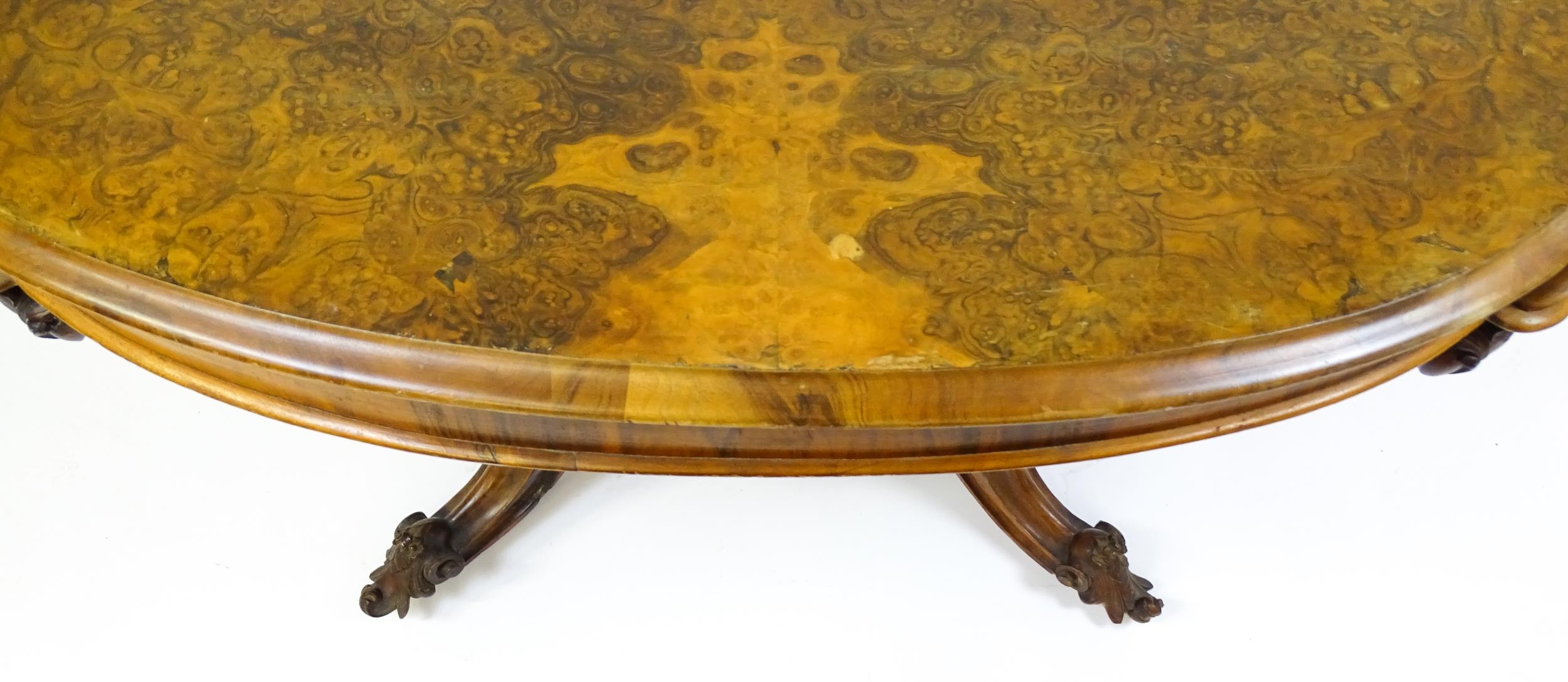 A 19thC burr walnut centre table with a moulded top above four acanthus carved supports, a large - Image 9 of 16