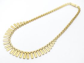 A 9ct gold necklace formed as a Cleopatra collar. Approx 16" long Please Note - we do not make
