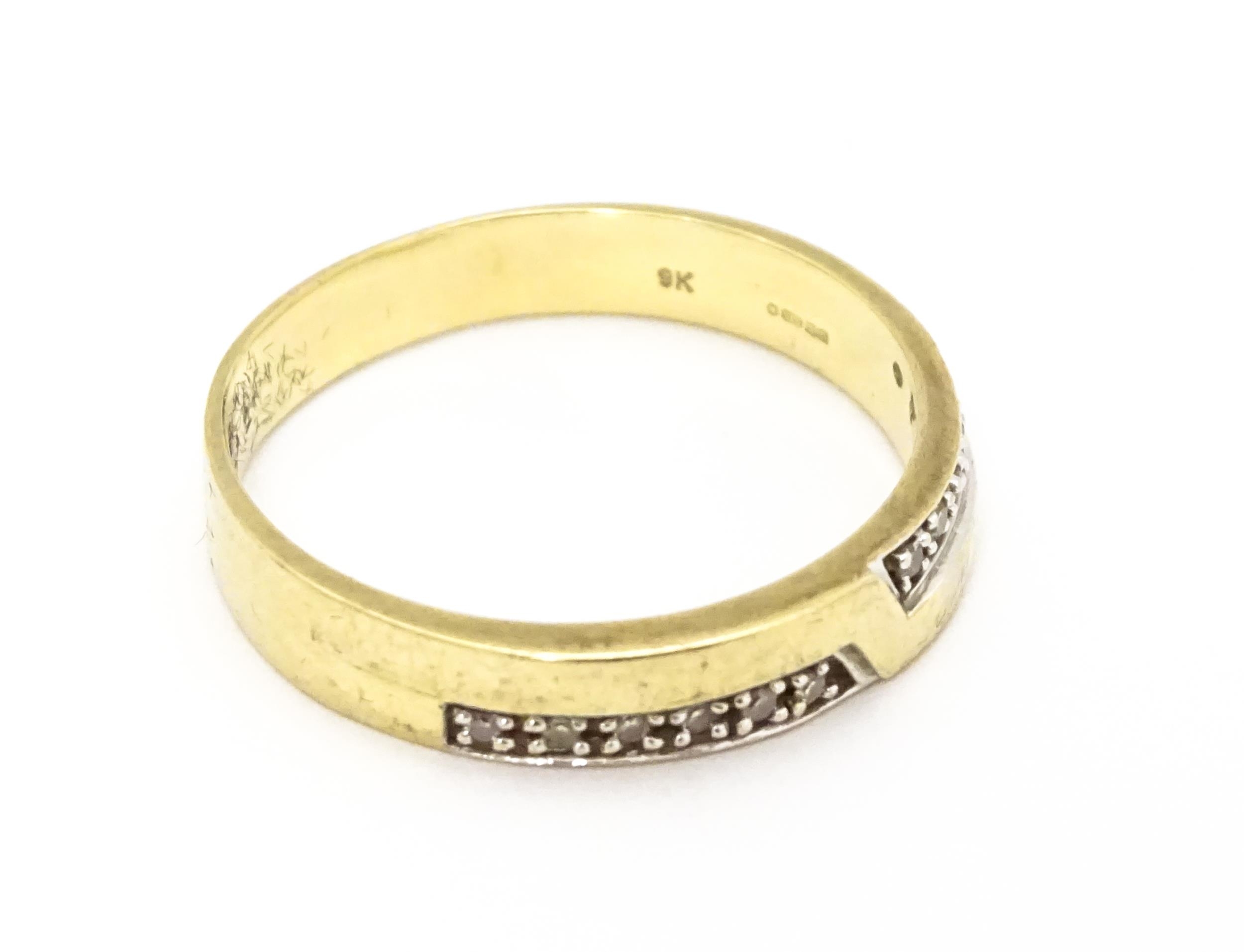 A 9ct gold ring set with white stones in white metal settings. Ring size approx. T Please Note - - Image 7 of 8