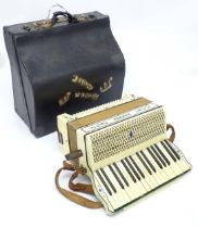 Musical Instrument : a c1930s Hohner Tango II accordion, the body decorated with floral inlay, 34
