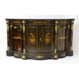 A 19thC ebonised credenza with satinwood marquetry decoration depicting panels of flowers and