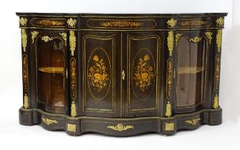 A 19thC ebonised credenza with satinwood marquetry decoration depicting panels of flowers and