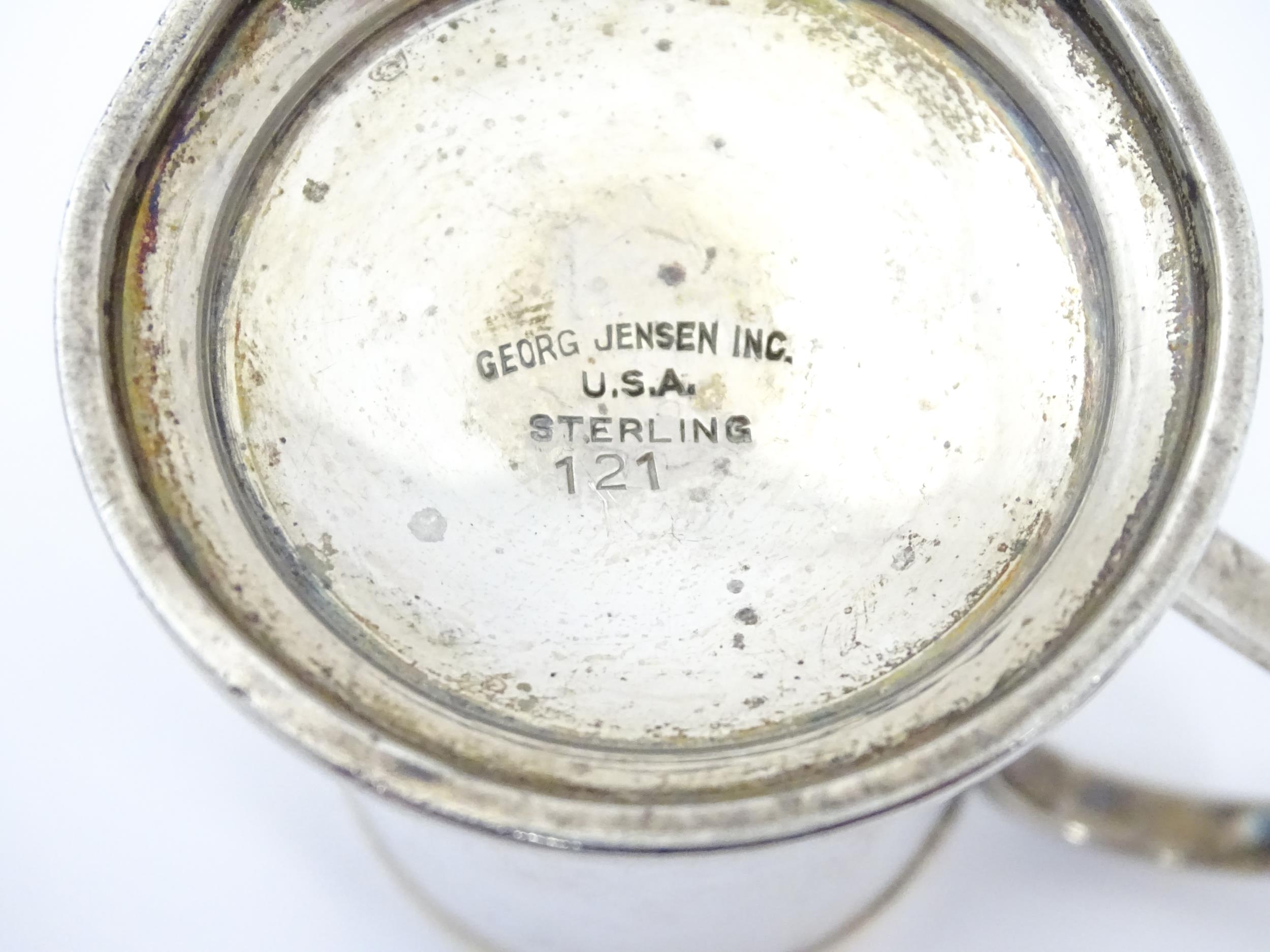 An American sterling silver pepperette modelled as a flour shaker. Marked under Georg Jensen Inc, - Image 2 of 8