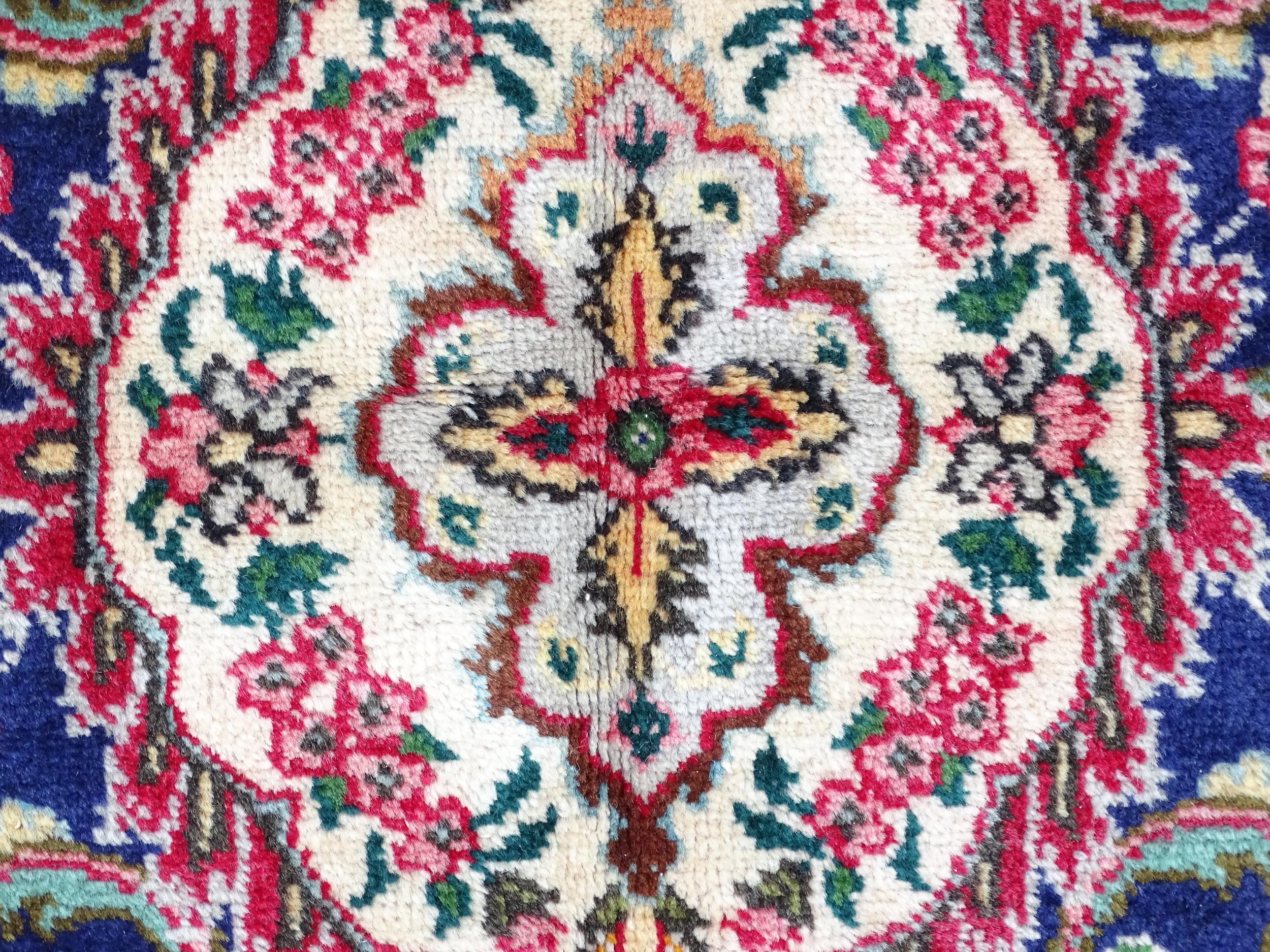 Carpet / Rug: A North West Persian Tabriz carpet the red ground with central cream and blue - Image 8 of 11