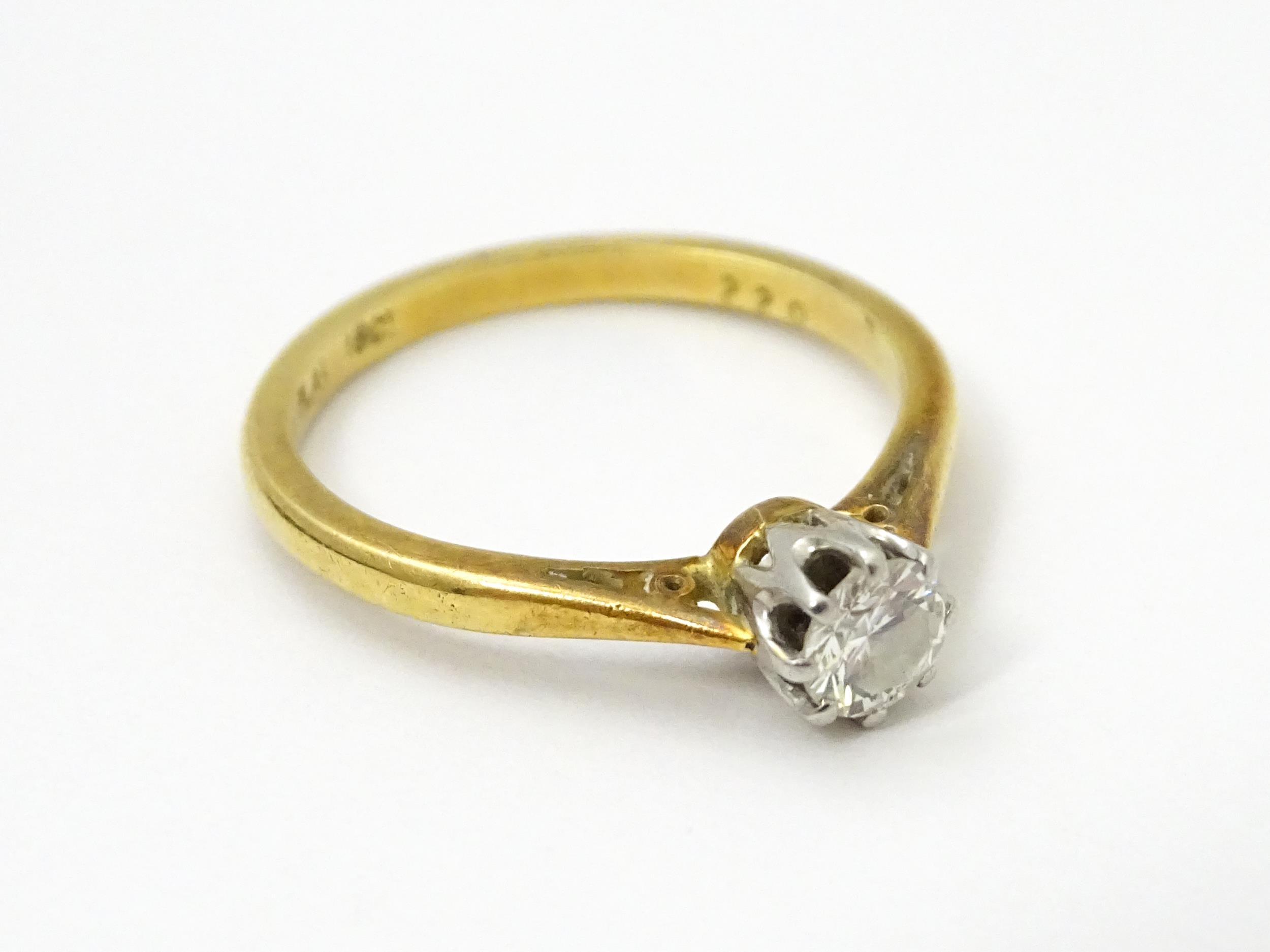 An 18ct gold ring set with diamond solitaire. Ring size approx. M 1/2 Please Note - we do not make - Image 6 of 7