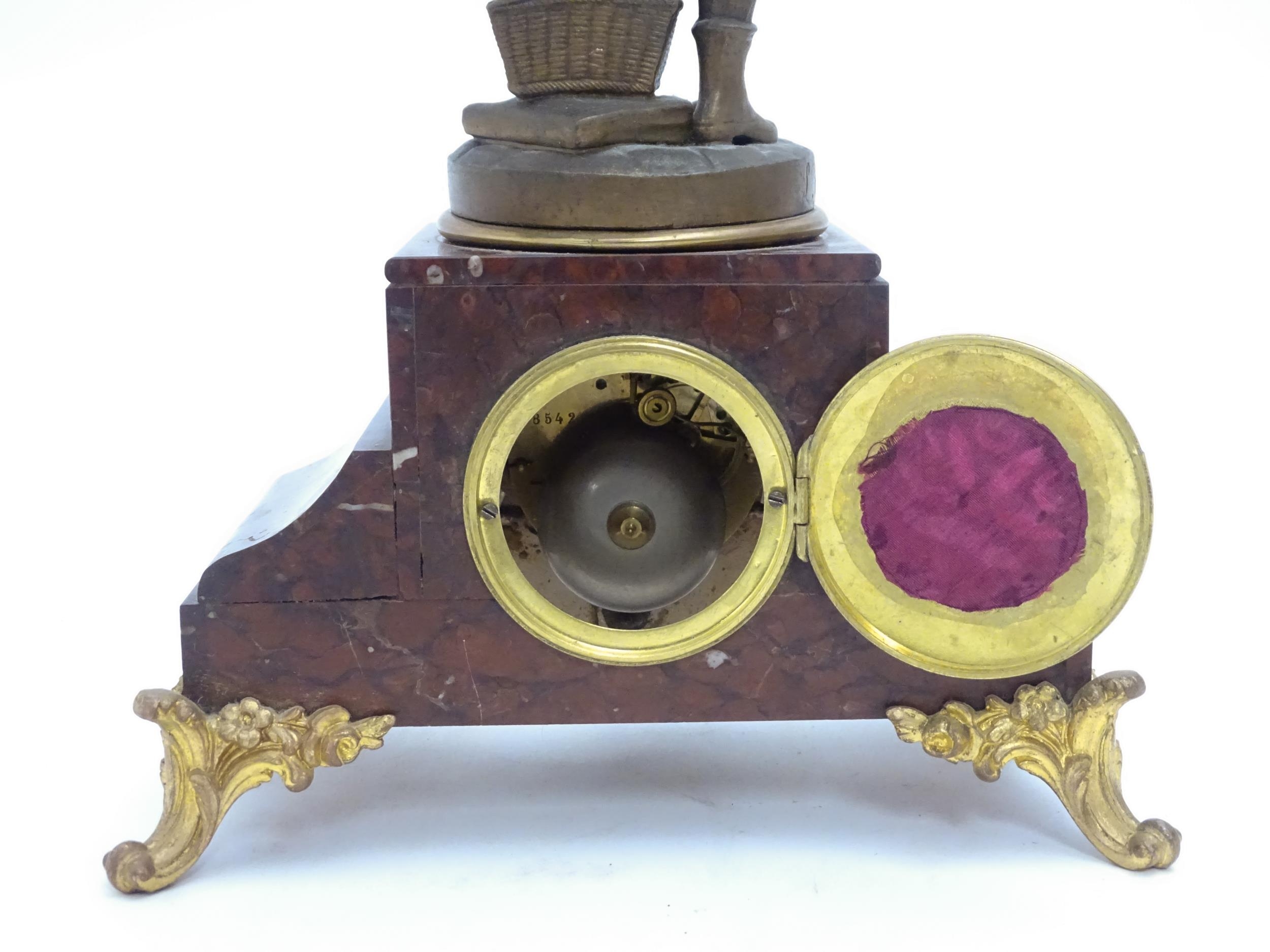 A French 8-day mantel clock striking on a bell, the rouge marble base housing a movement by A. D. - Image 12 of 16